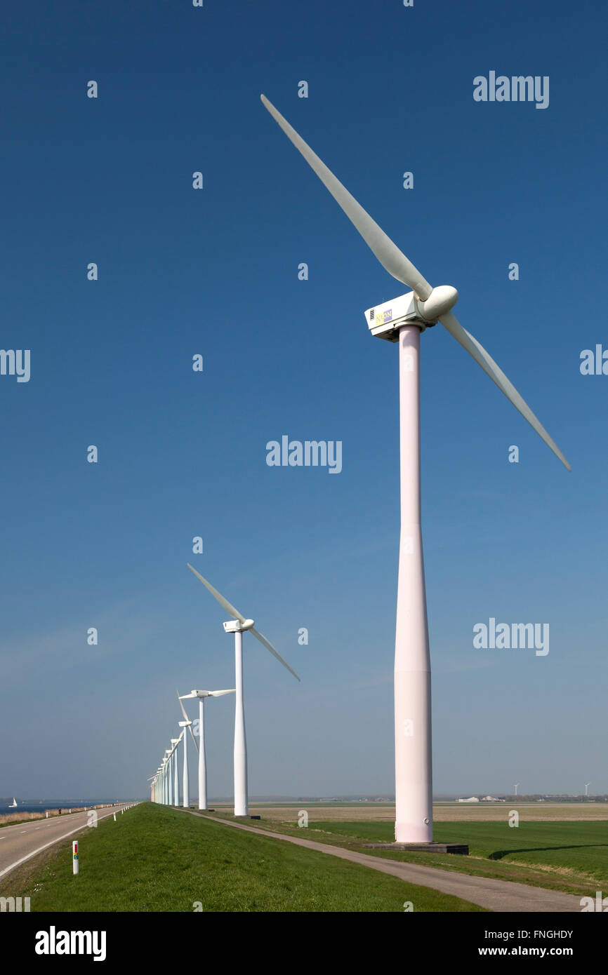 Windmills on the Eemmmeerdijk in Holland Stock Photo