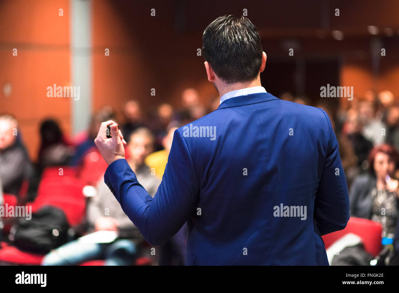 Public speaker giving talk at Business Event Stock Photo - Alamy