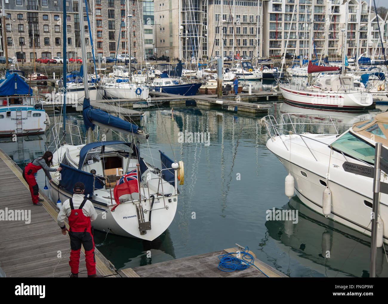 Yacht being moored at Sutton Harbour Marina,Plymouth Stock Photo Alamy