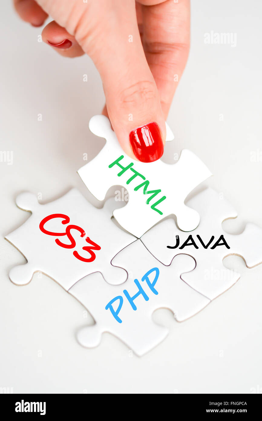Software development concept with pieces of puzzle Stock Photo