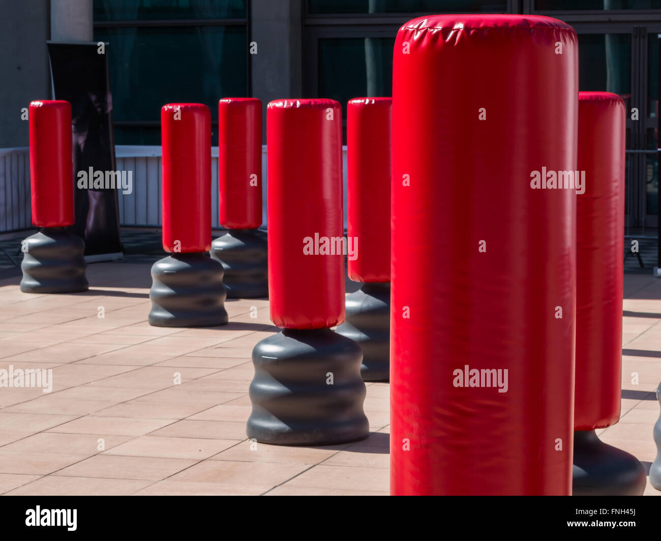 Group of Red Punching Bag for Kickboxing and Fitness Exercise Stock