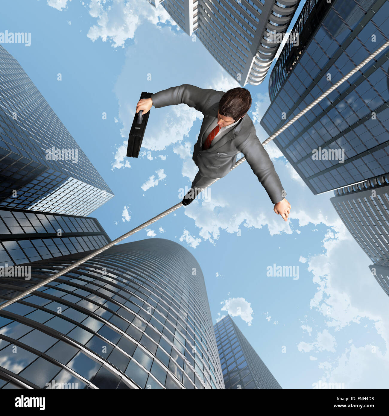 businessman balancing on a rope Stock Photo