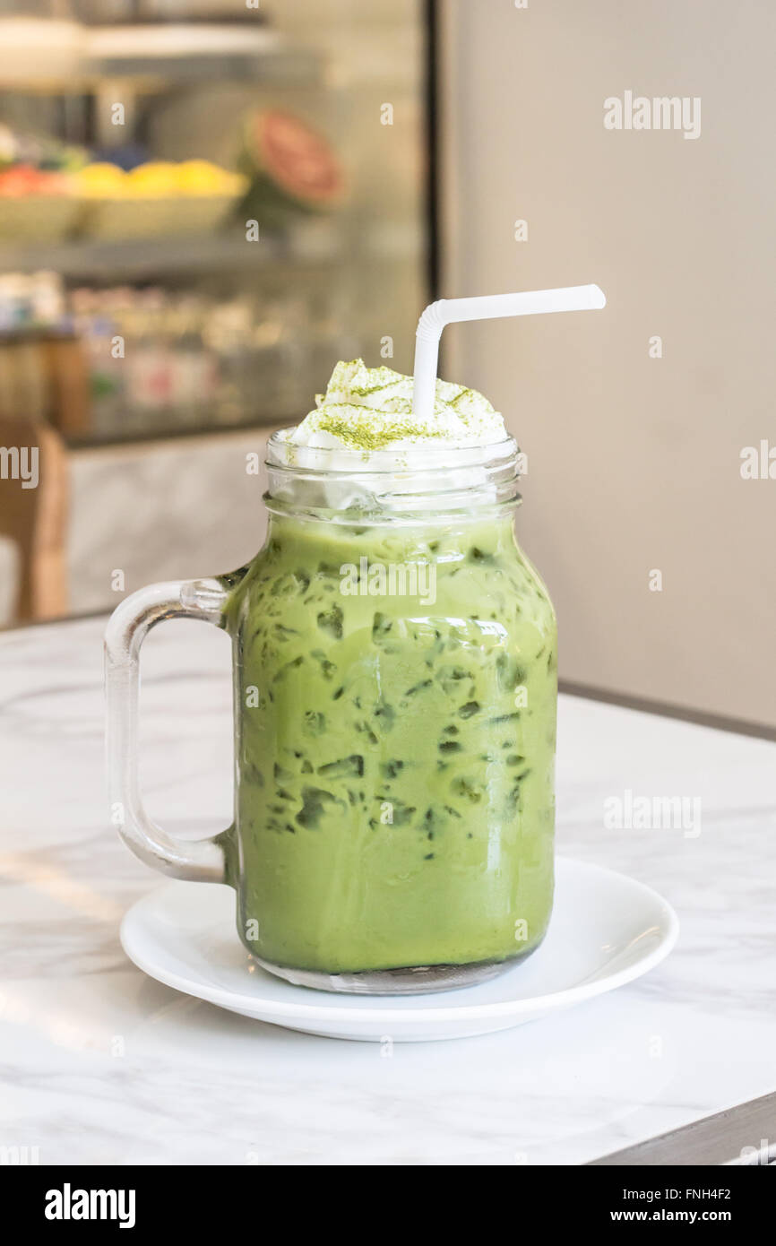 Ice green tea with milk Stock Photo Alamy