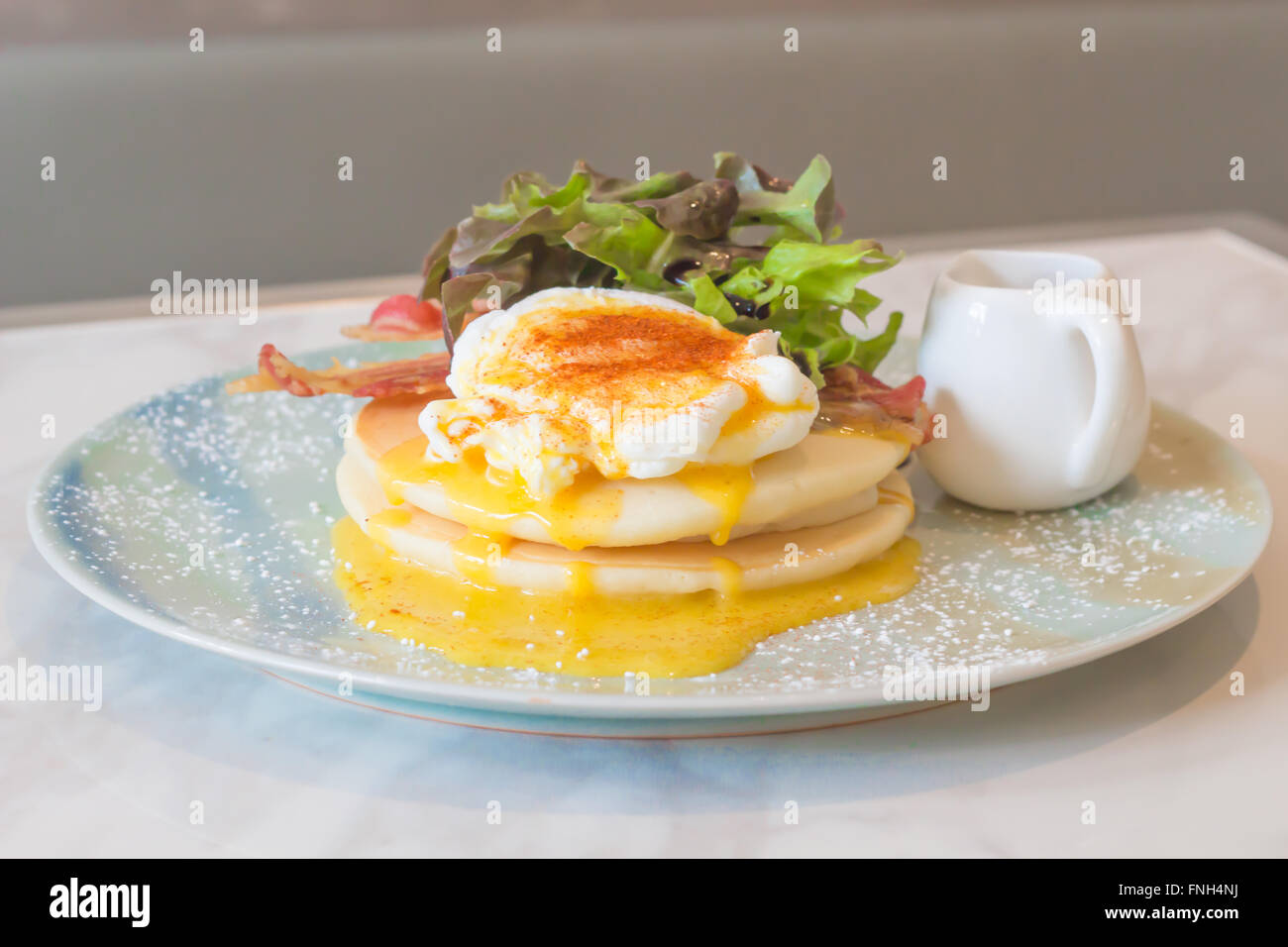 Pancakes with Eggs Benedict Stock Photo Alamy