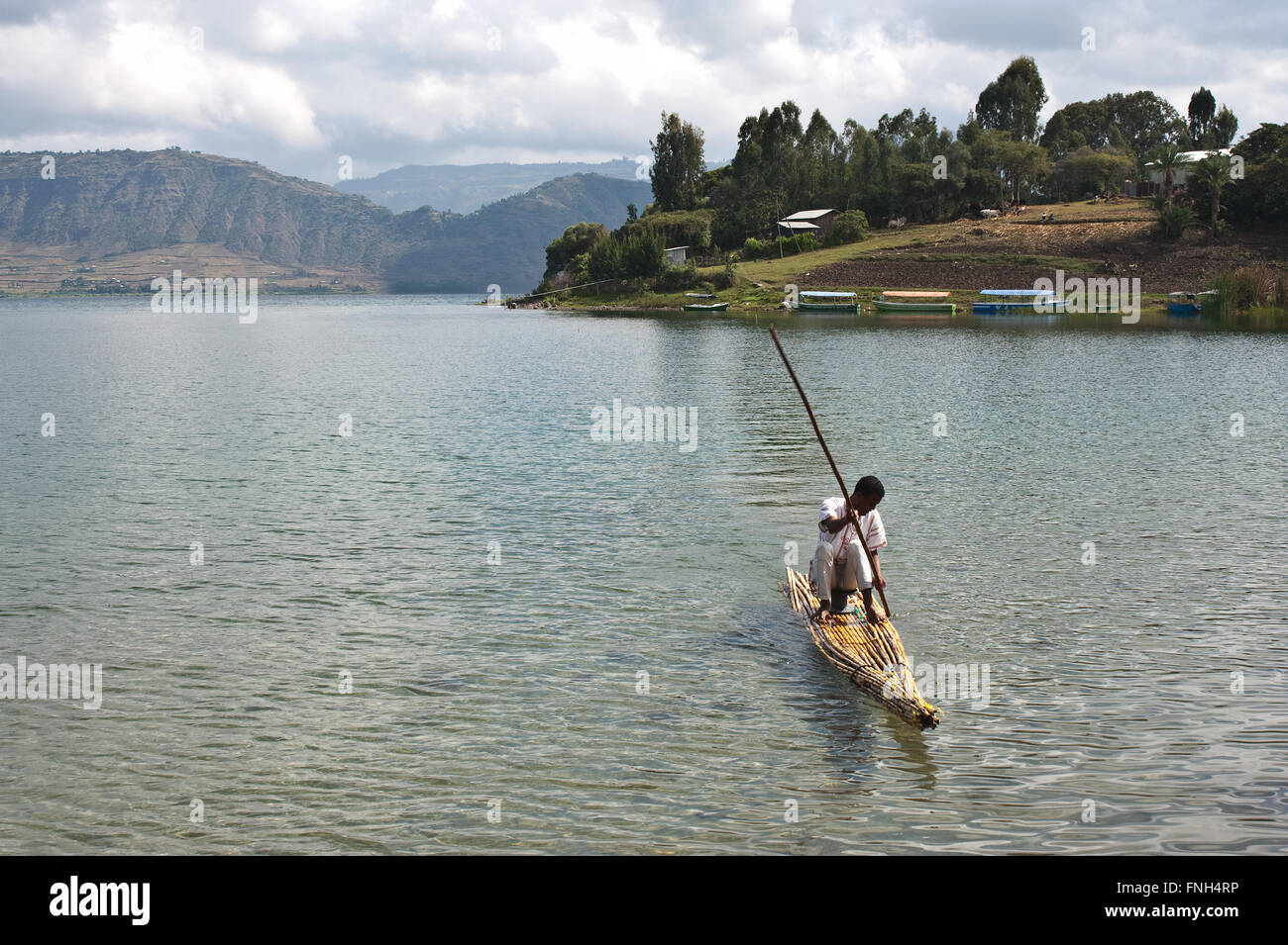 Man boating on a papyrus boat ( Ethiopia) Stock Photo