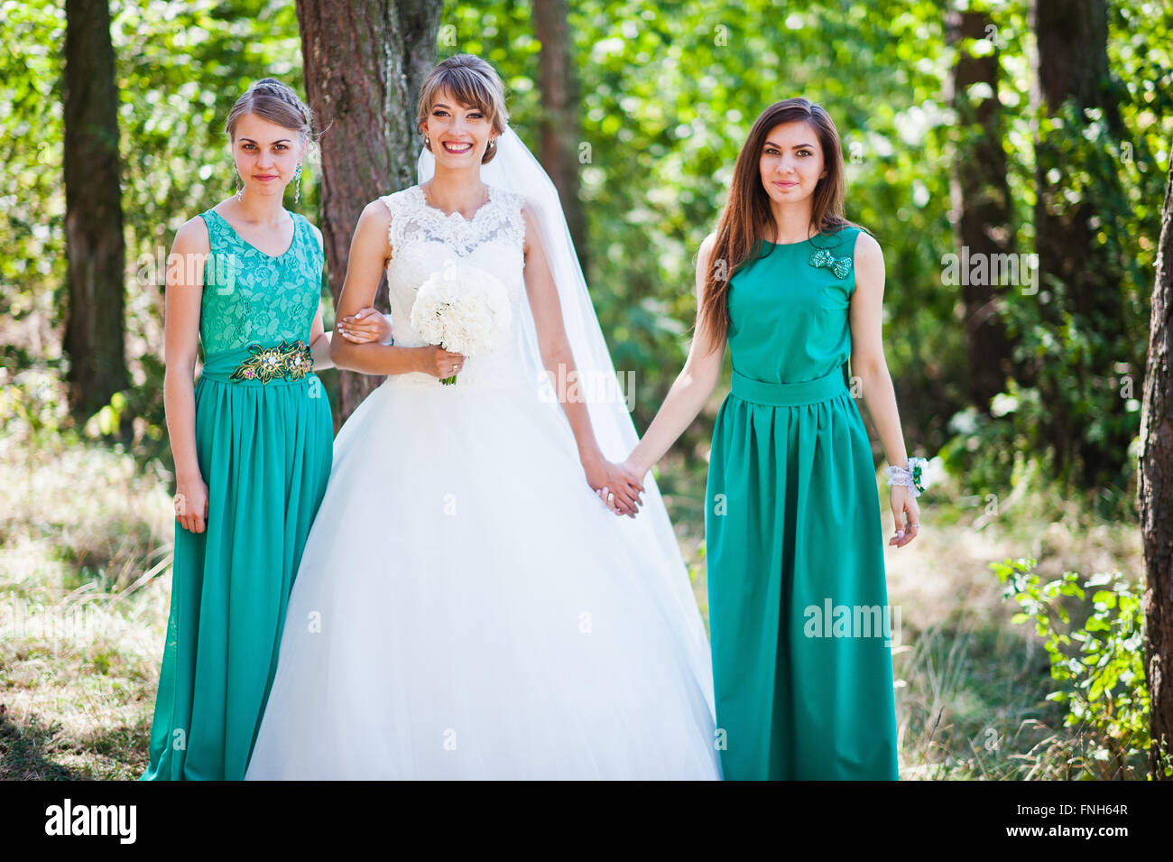 bride and two bridesmaids