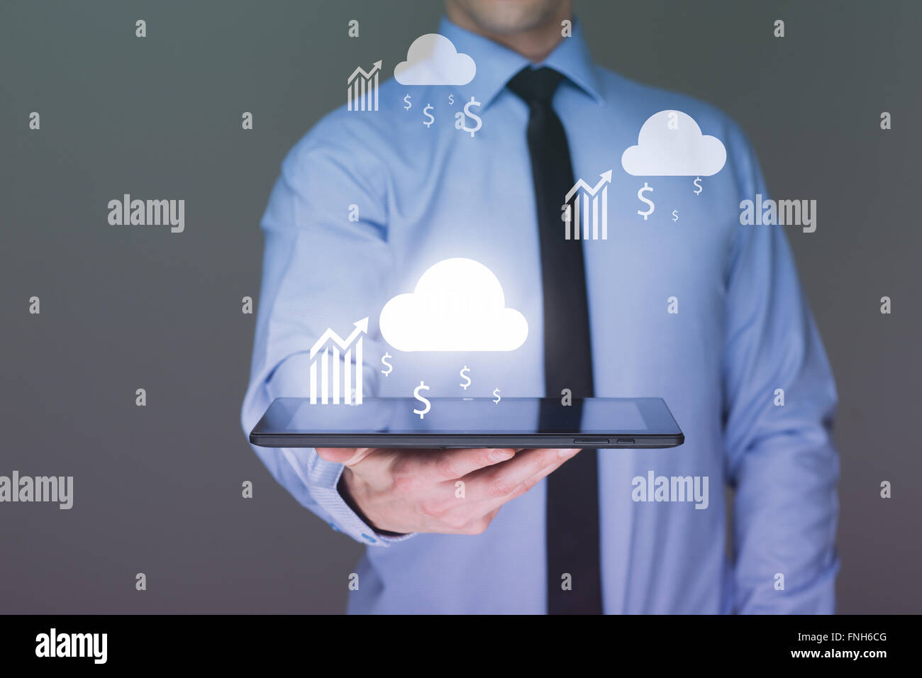 Business man using tablet PC with social media icon set Stock Photo
