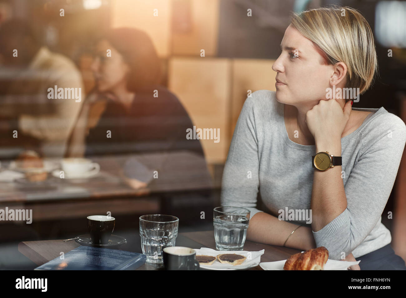Blonde woman wearing casual hi-res stock photography and images - Alamy