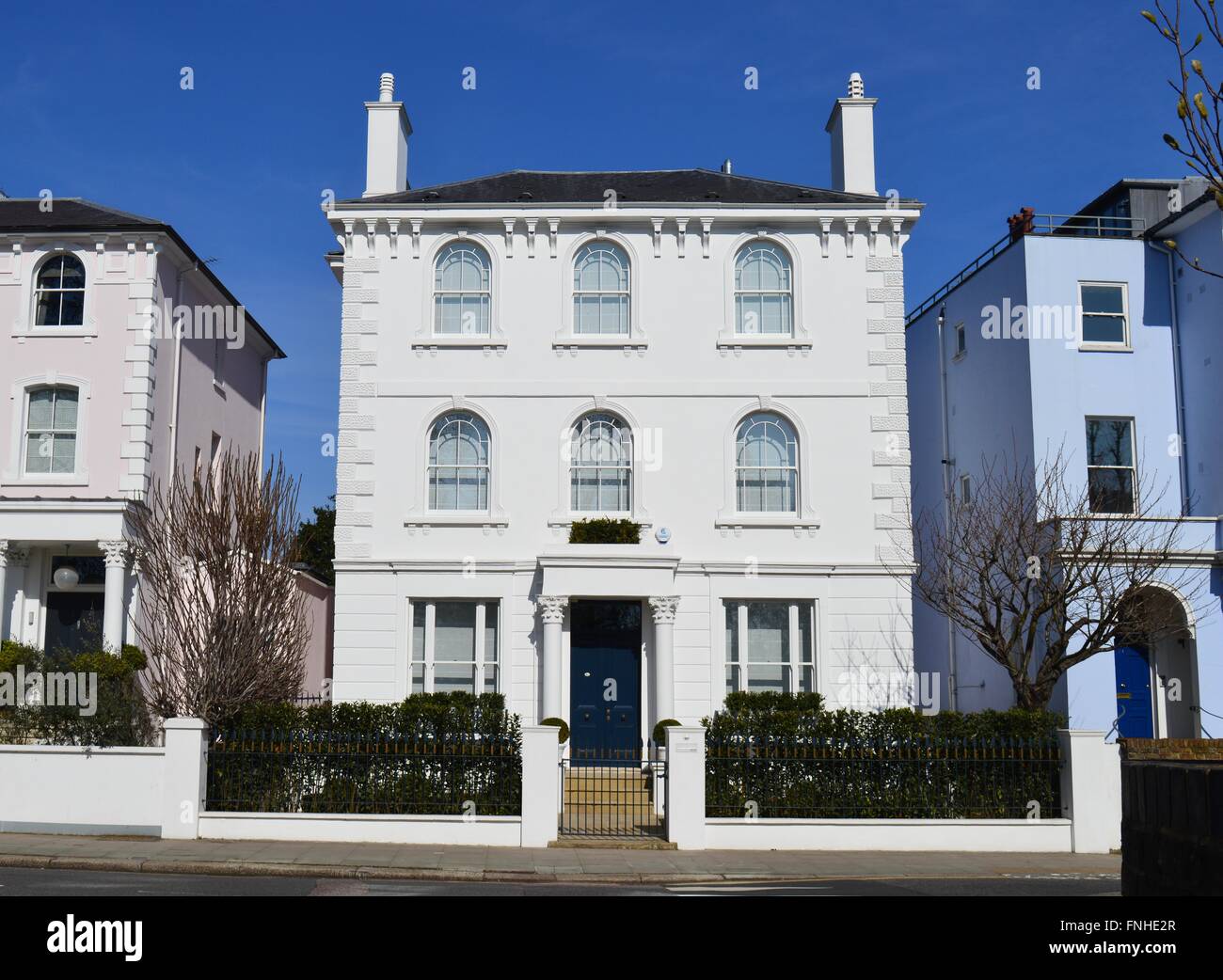 A beautiful white double-fronted Victorian house in a prime residential street in Primrose Hill, London UK Stock Photo