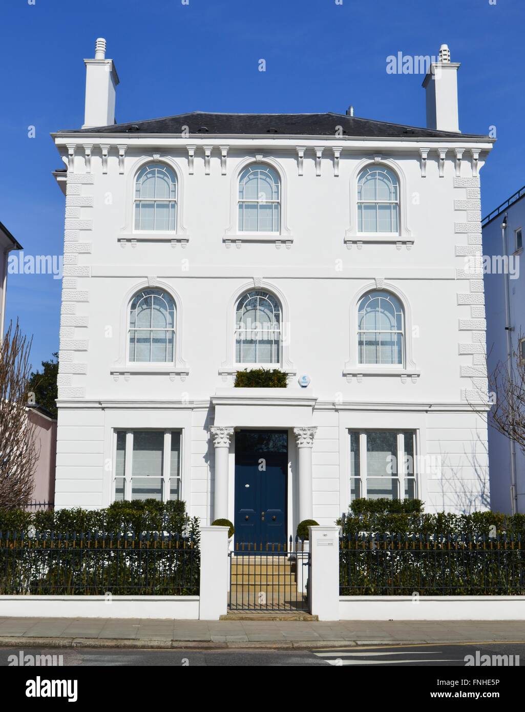 Large and beautiful white double fronted Victorian house in Primrose Hill, London UK. A dream home, prime property real estate, Stock Photo