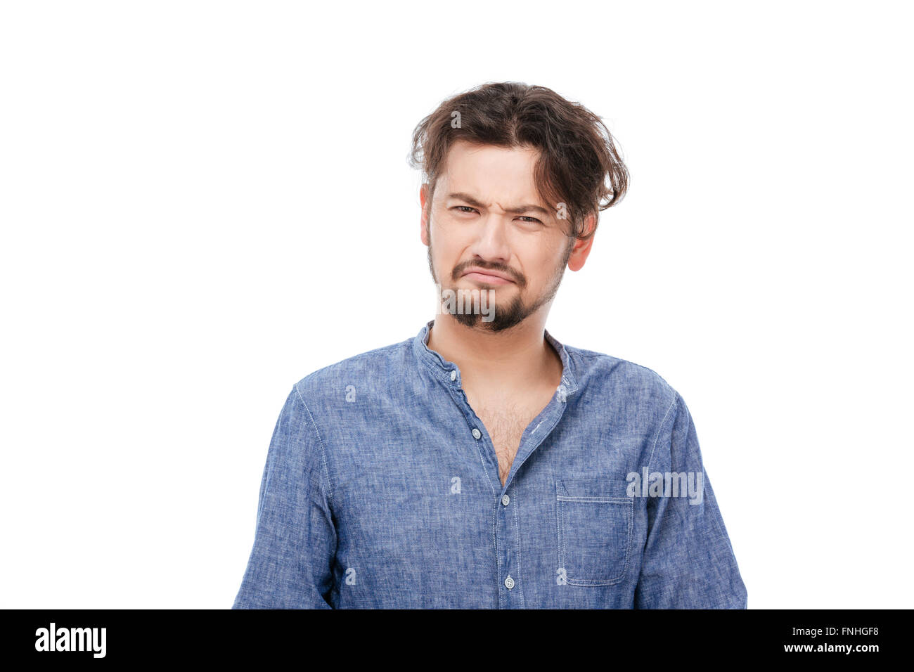 Sad man standing isolated on a white background Stock Photo - Alamy