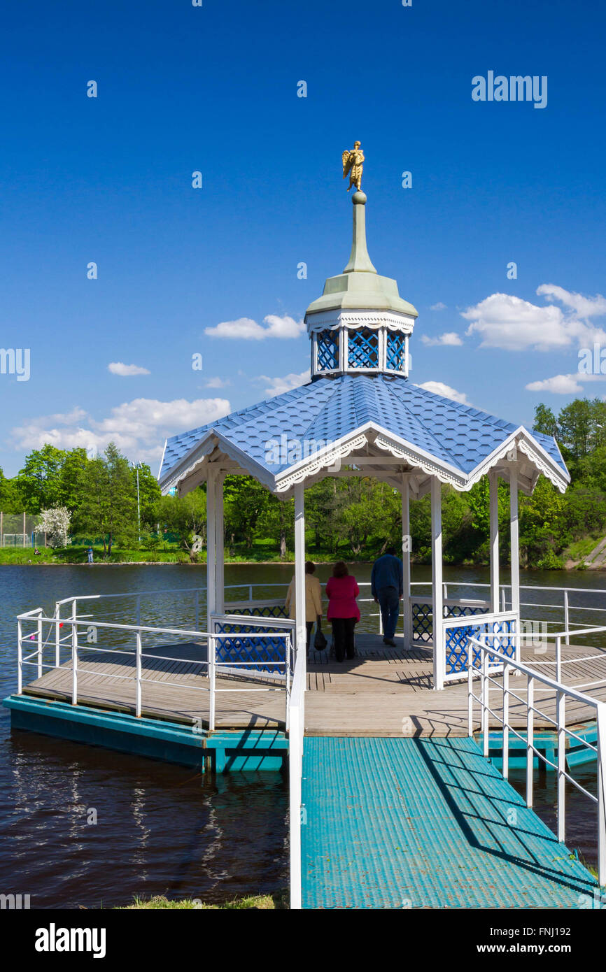 Carved wooden gazebo by the river Stock Photo - Alamy