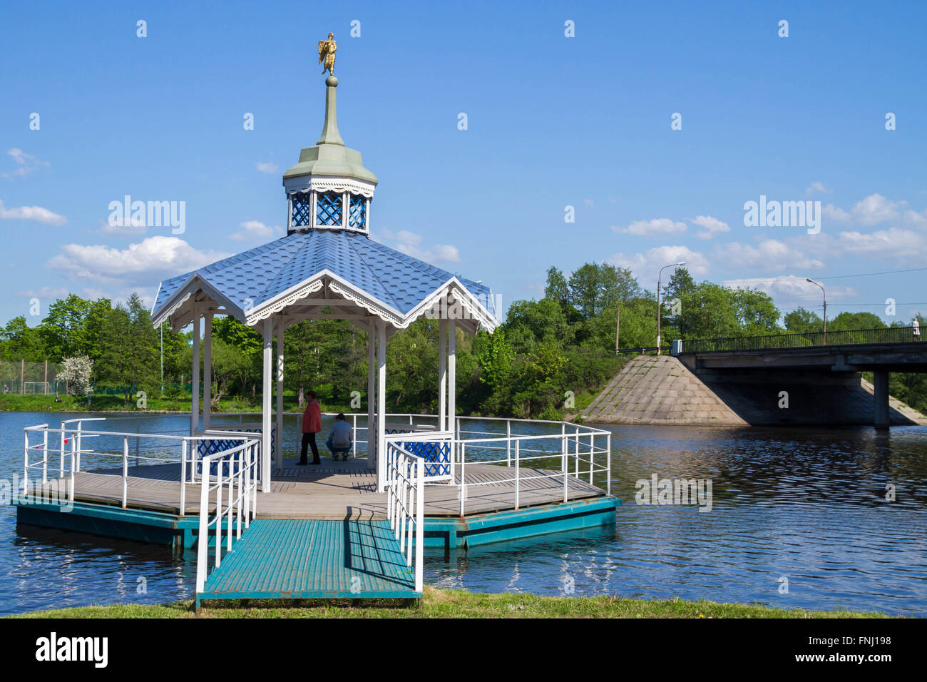 Carved wooden gazebo by the river Stock Photo - Alamy