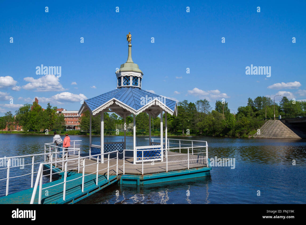 Carved wooden gazebo by the river Stock Photo - Alamy