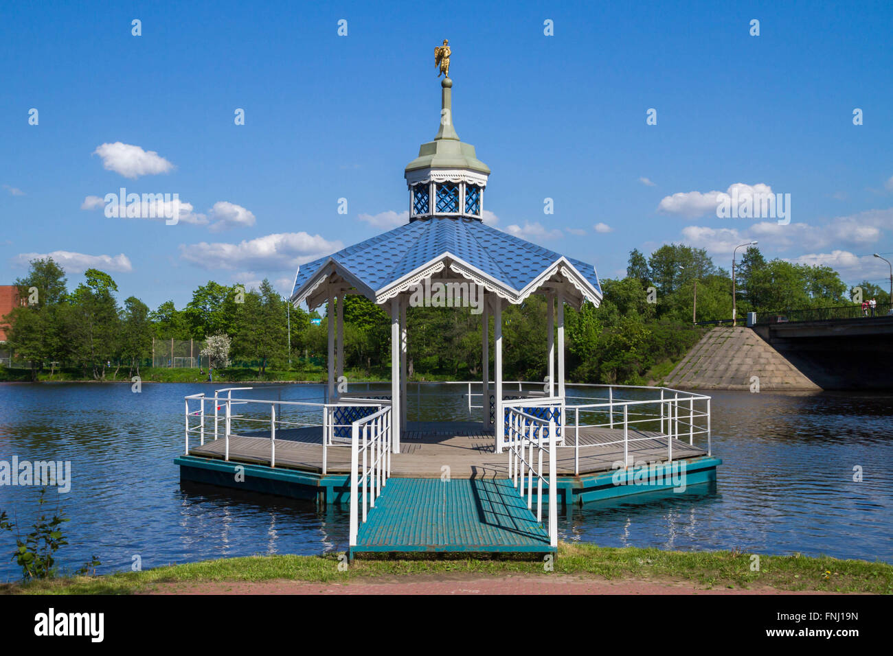 Carved wooden gazebo by the river Stock Photo - Alamy