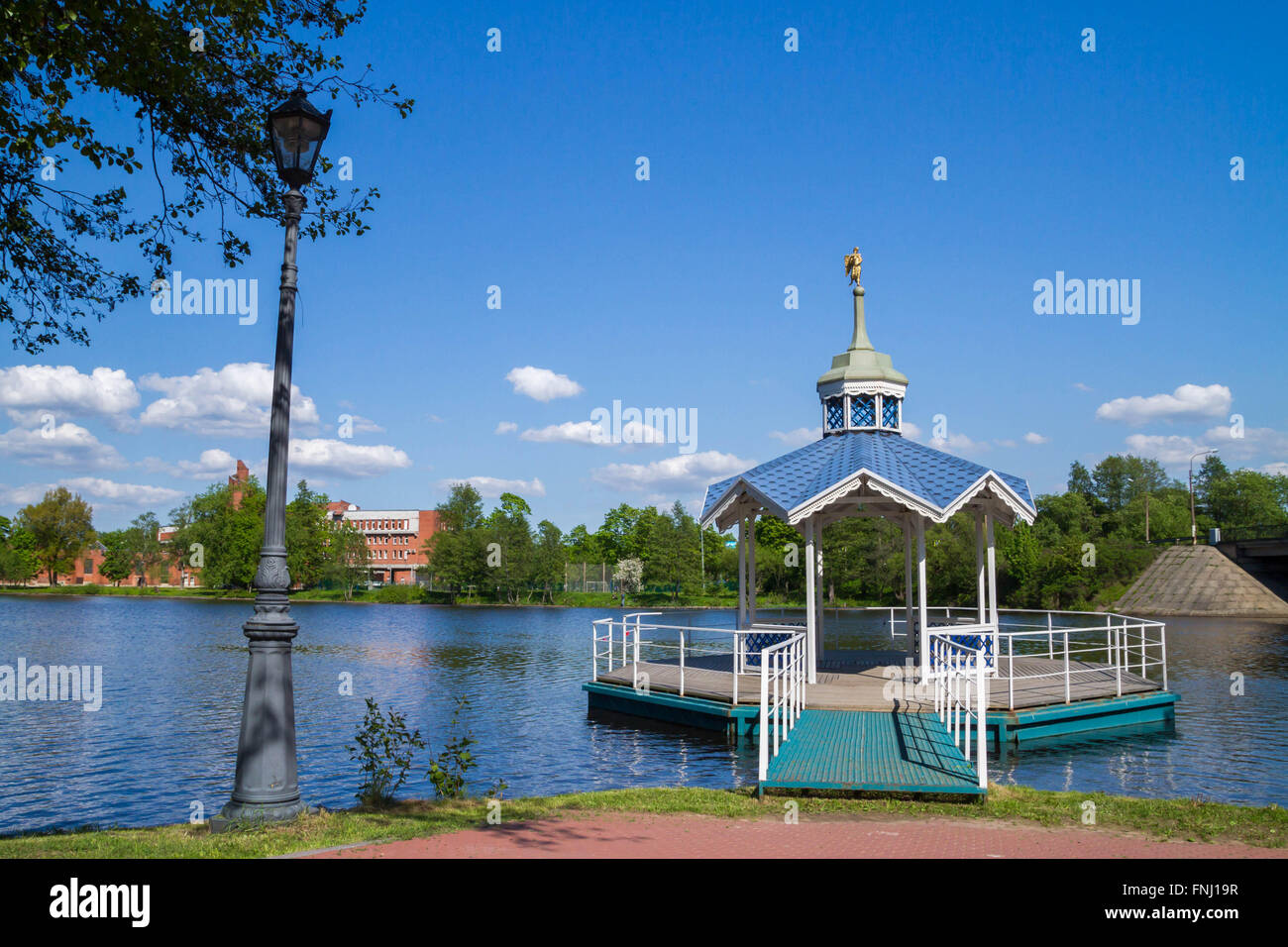 Carved wooden gazebo by the river Stock Photo - Alamy
