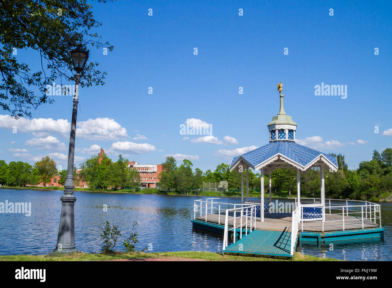Carved wooden gazebo by the river Stock Photo - Alamy