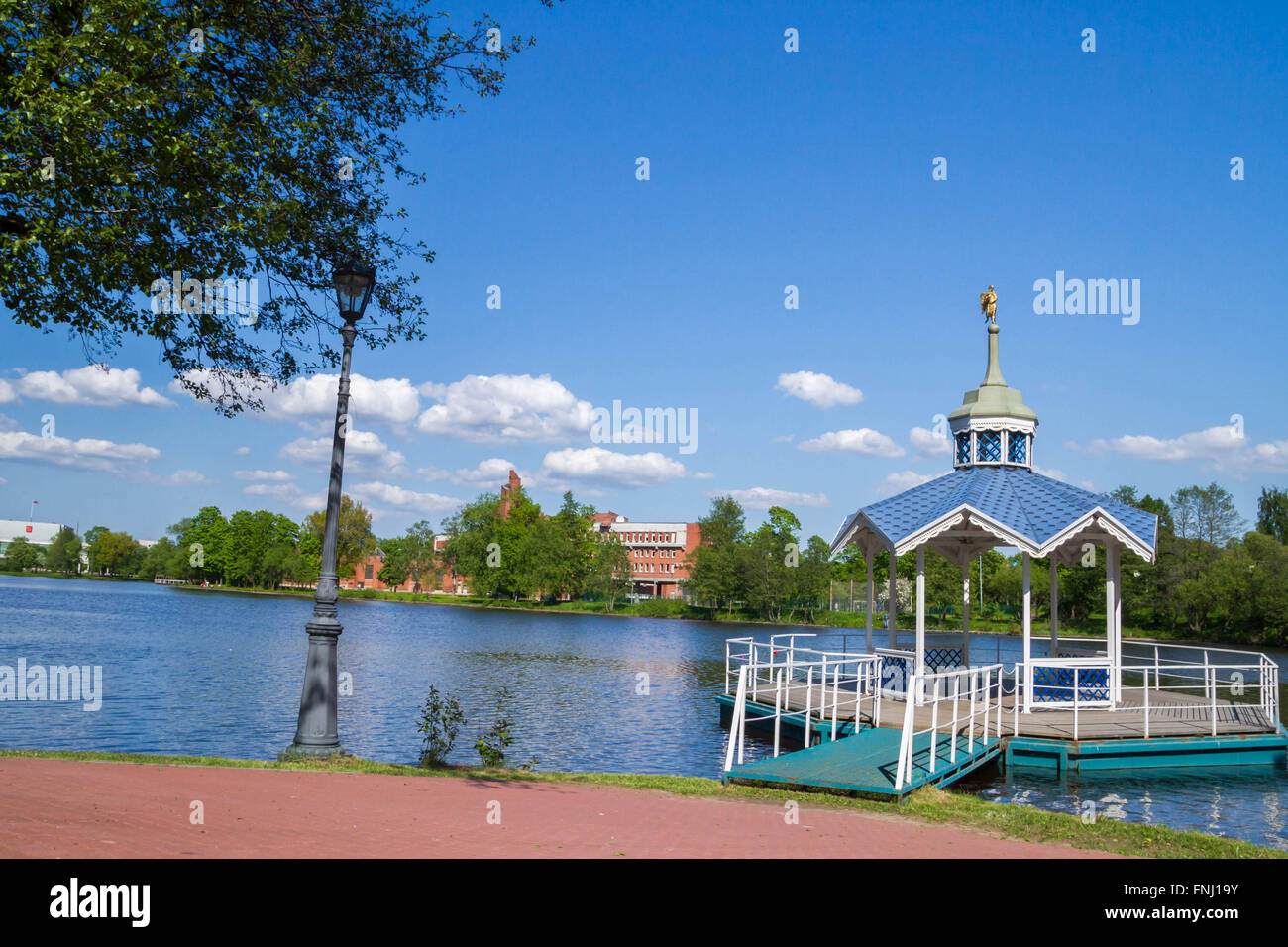 Carved wooden gazebo by the river Stock Photo - Alamy