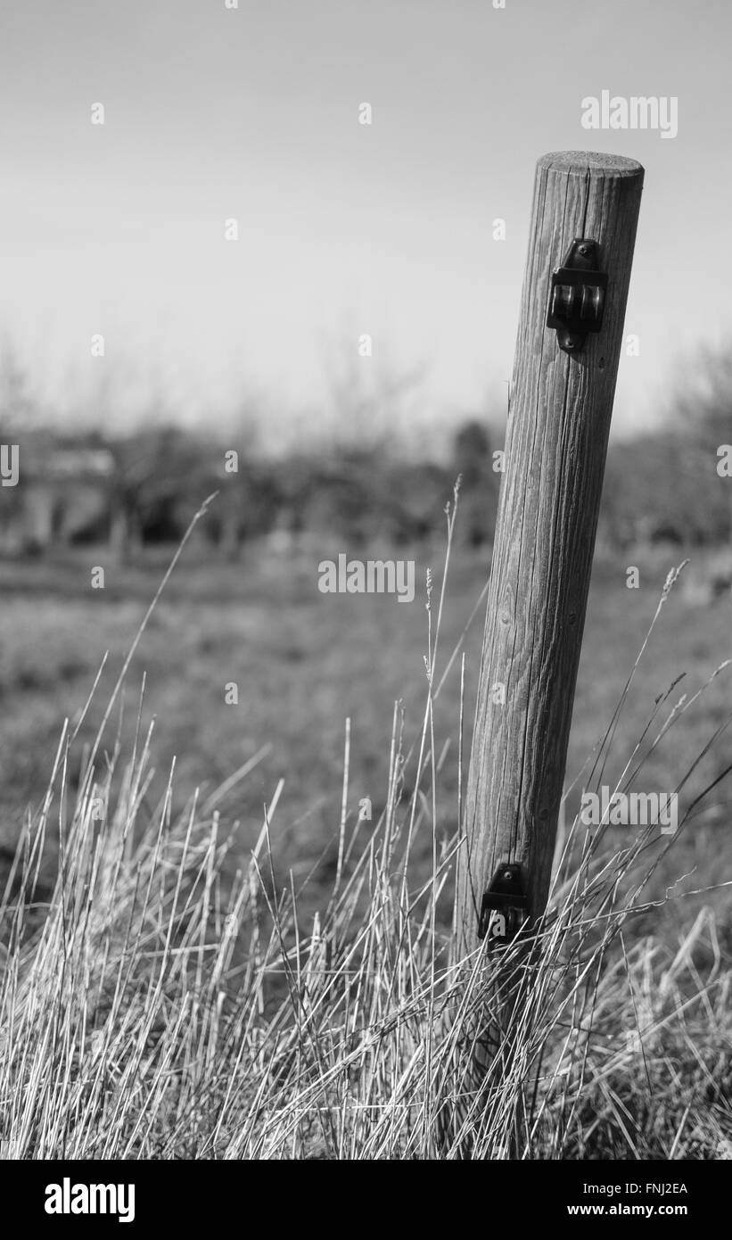 Fence with electric wire Black and White Stock Photos & Images - Alamy