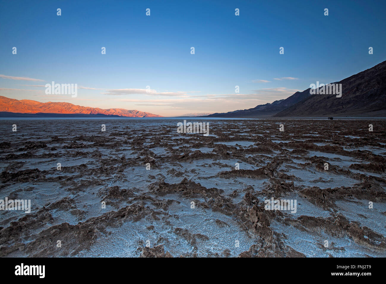Salt flats at Badwater Basin at sunrise, Death Valley National Park, California, United States of America Stock Photo