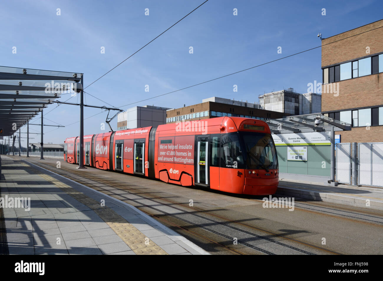 Tram at Nottingham QMC Bridge. Stock Photo