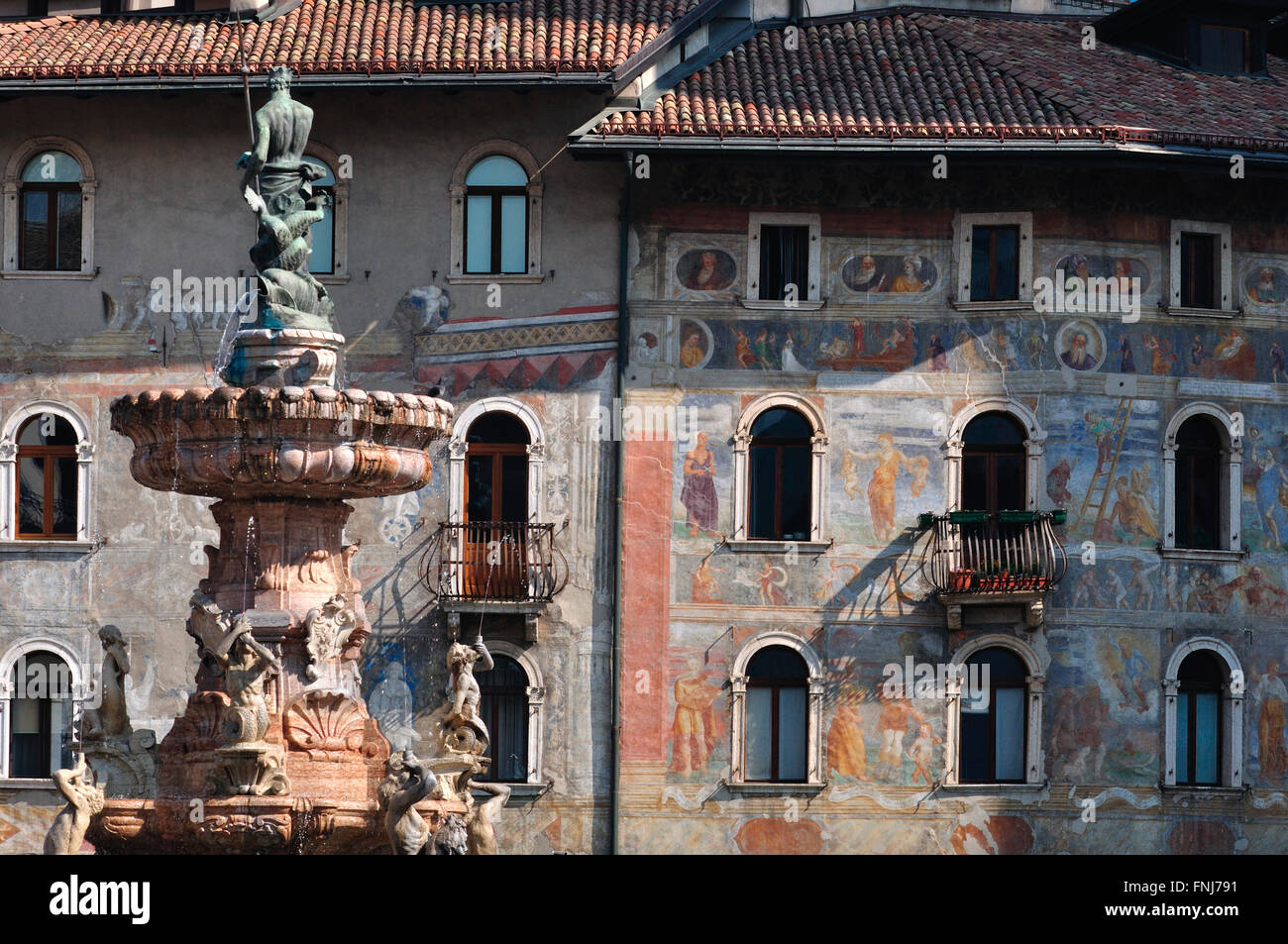 Italy, Trentino Alto Adige, Trento, Duomo square, Neptune Fountain background Casa Cazuffi-Rella fresco by Marcello Fogolino Stock Photo