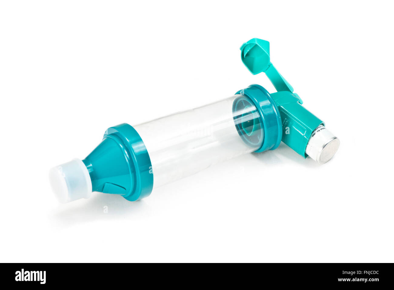 Asthma Inhaler spacer chamber on white. Stock Photo