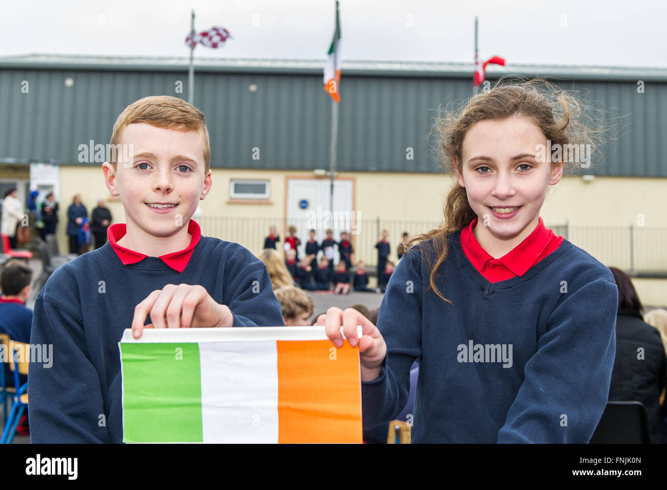 Durrus, Ireland. 15th March, 2016. Pupils James Mallon and Aisling Stock display their classes version of the Proclamation at Carrigboy National School, Durrus, on Proclamation Day which was held to commemorate the events of 1916. Credit: Andy Gibson/Alamy Live News. Stock Photo