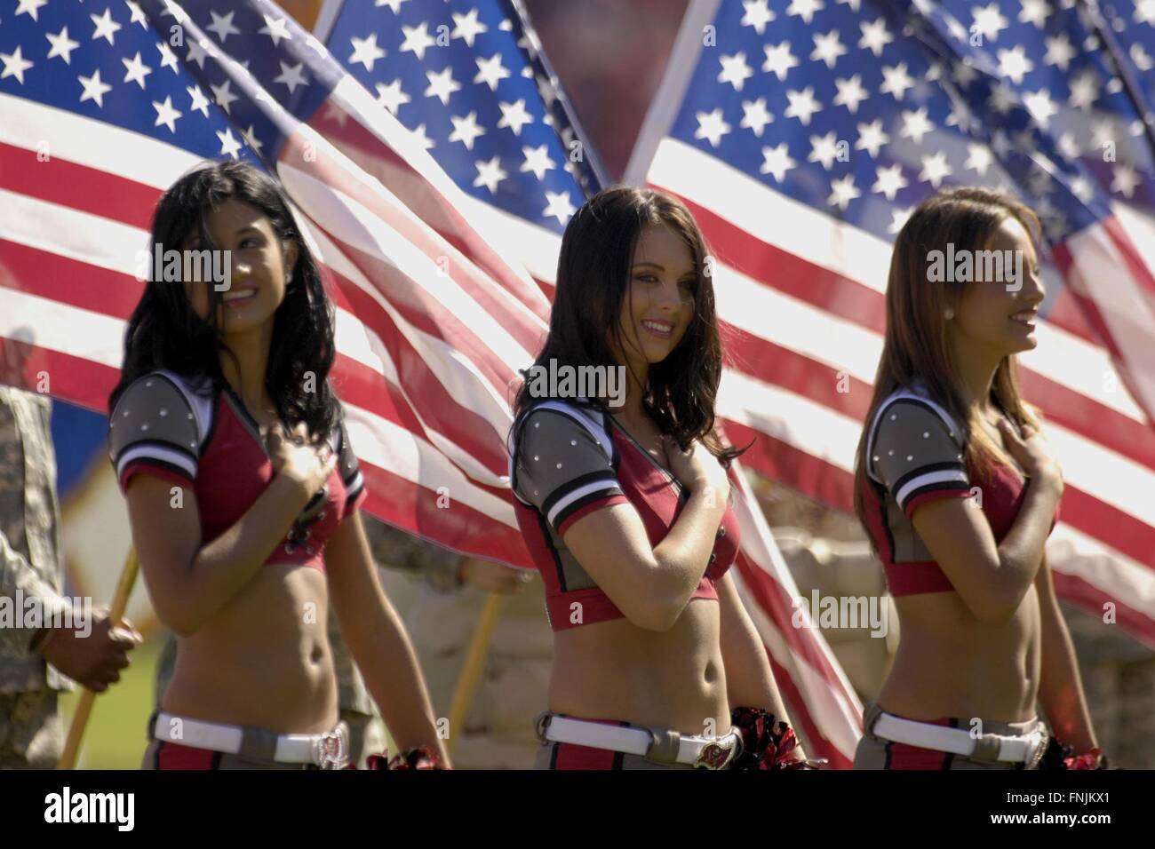 Tampa, Florida, USA. 19th Nov, 2006. Nov. 19, 2006; Tampa, FL, USA; Tampa Bay Buccaneers cheerleaders during the National Anthem prior to the start of the Bucs game against the Washington Redskins at Raymond James Stadium. ZUMA Press/Scott A. Miller © Scott A. Miller/ZUMA Wire/Alamy Live News Stock Photo
