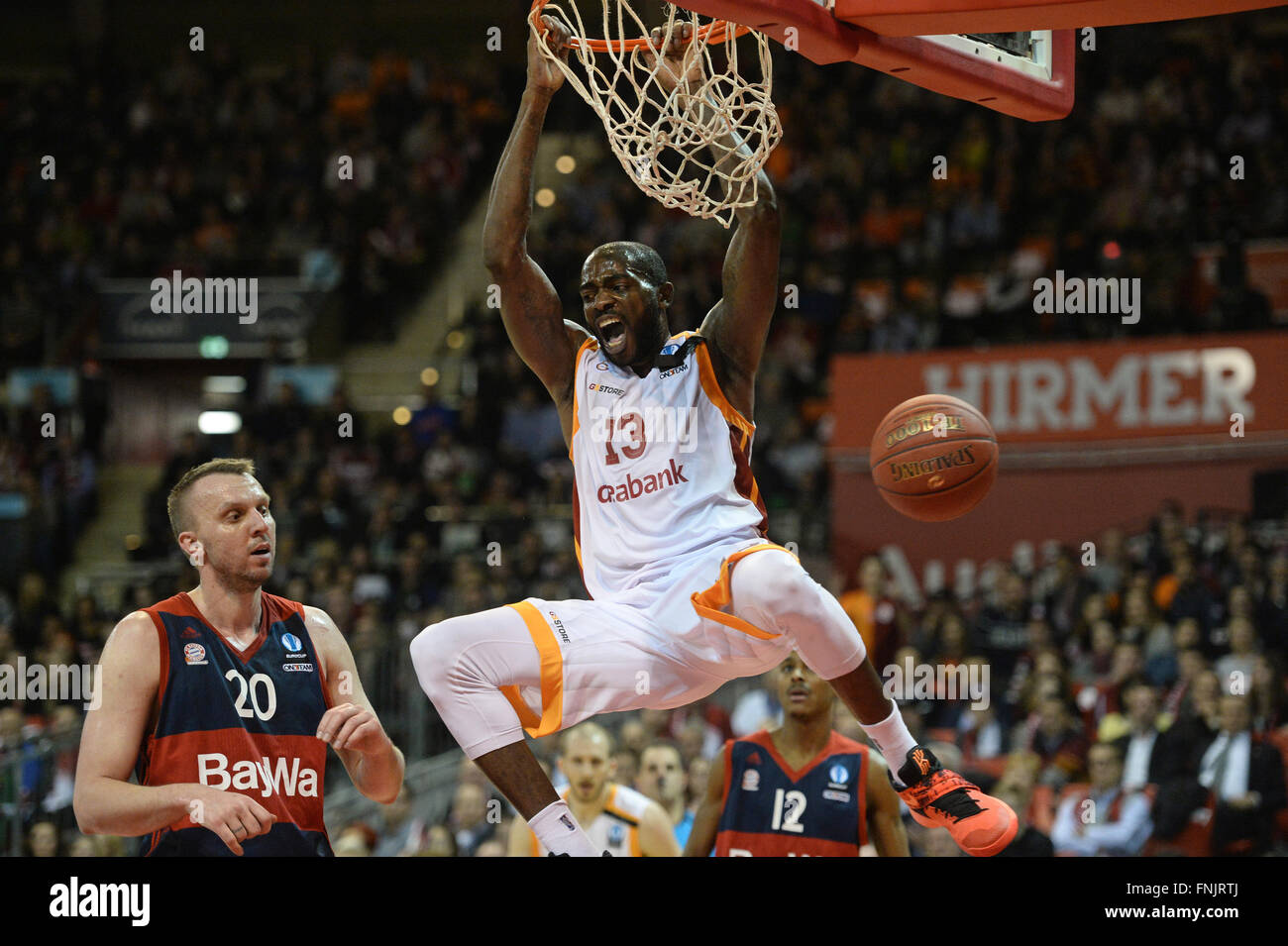 Munich, Germany. 15th Mar, 2016. Galatasaray's Stephane Lasme celebrates a  layup during the Eurocup quarter final first leg basketball match between Bayern  Munich and Galatasaray S.K. at the Audi Dome in Munich,