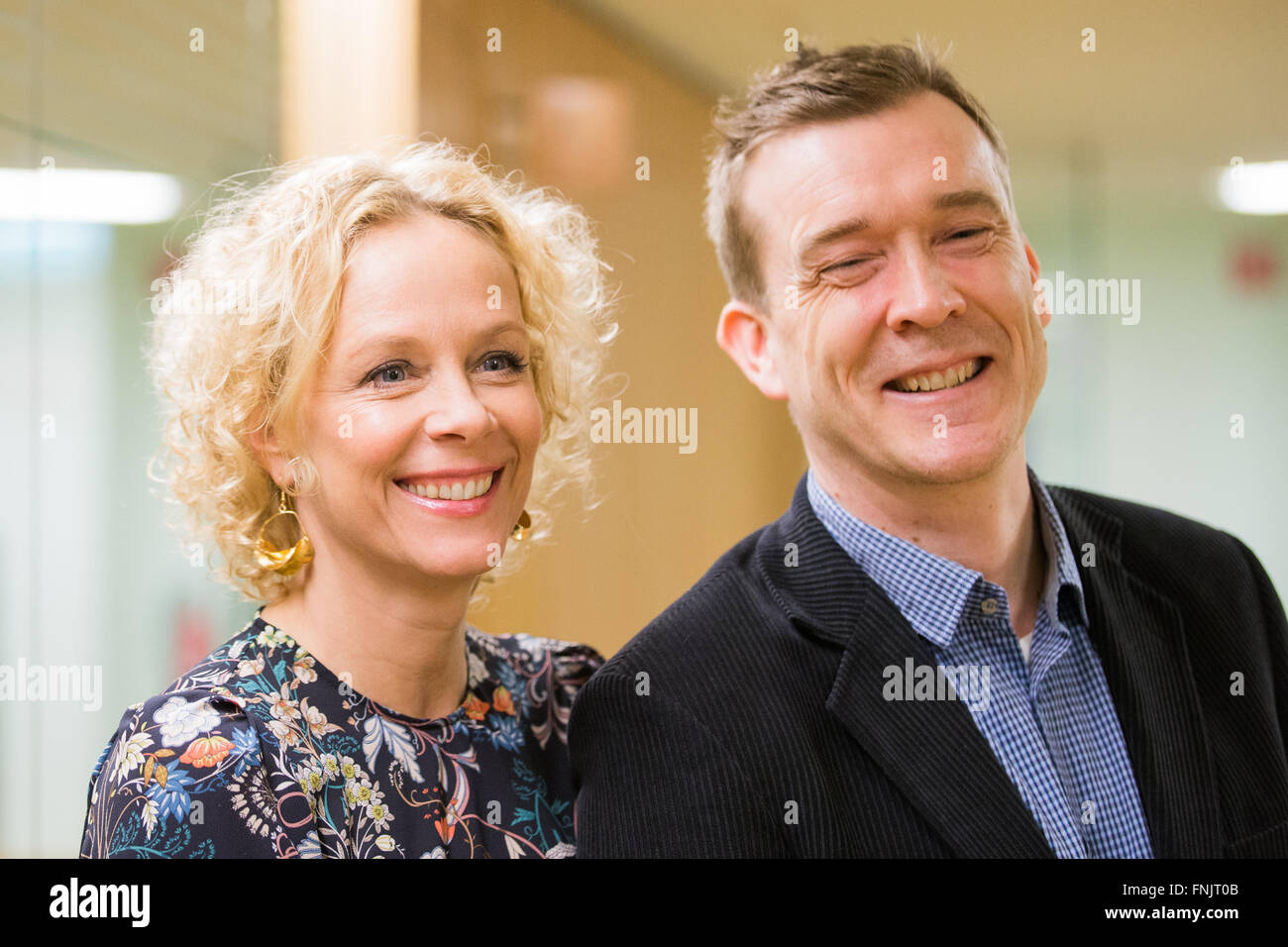Cologne, Germany. 15th Mar, 2016. British writer David Mitchell (R) and German actress Katja Riemann pose at the international literature festival Lit.Cologne in Cologne, Germany, 15 March 2016. Mitchell's new book 'The Bone Clocks' is a metaphysical thriller, a moral treatment and chronicle of our self-destructive actions. Lit.Cologne, Europe's largest literature festival according to the organisers, runs until 19 March 2016. Photo: ROLF VENNENBERND/dpa/Alamy Live News Stock Photo