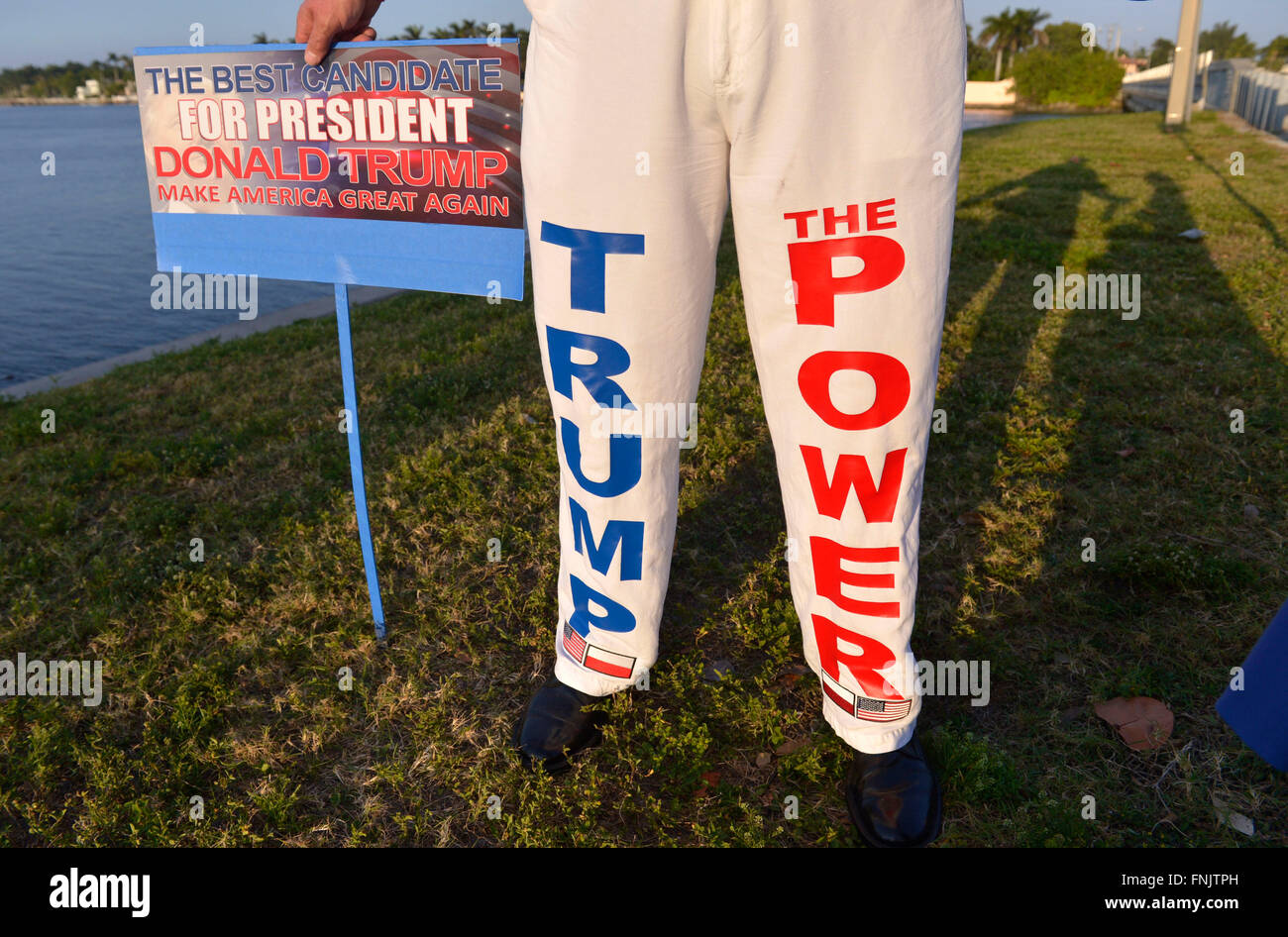 Miami, USA. 15th Mar, 2016. Janusz Biskupek, supporter of Donald Trump, stands in front of his Mar-A-Lago Club in Palm Beach, Florida, the United States, March 15, 2016. New York billionaire developer Donald Trump on Tuesday took a stride towards locking up the 2016 Republican presidential nomination after a crucial victory in the winner-take-all Florida primary, according to local media projection. © Yin Bogu/Xinhua/Alamy Live News Stock Photo