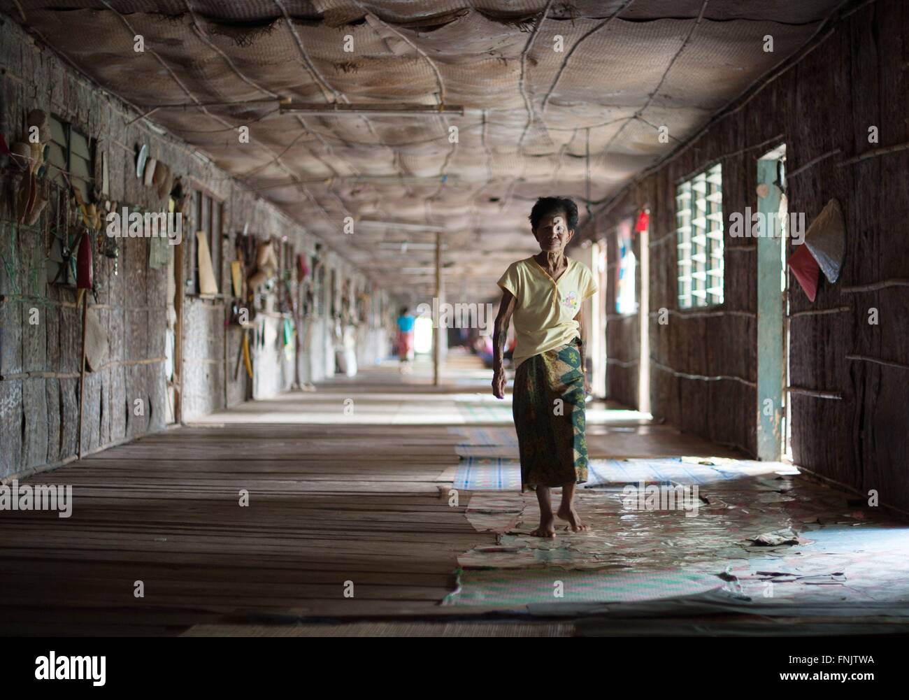 An Iban woman inside a traditional Iban longhouse near Lubok Antu, Malaysia, on 23 October 2014. Photo: Sebastian Kahnert - NO WIRE SERVICE - Stock Photo