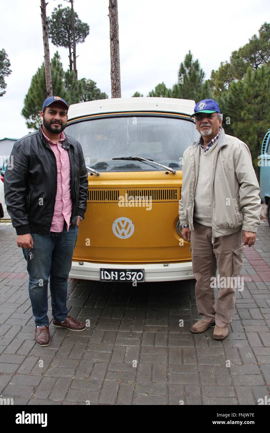 Islamabad, Pakistan. 06th Mar, 2016. Mahmood Jilani (R), owner of the German VW bus Gertrude, and his son pose next to the vehicle on a car park near Islamabad, Pakistan, 06 March 2016. Mahmood Jilani has owned the vehicle for more than 20 years and has kept it in a good condition ever since. Photo: CHRISTINE-FELICE ROEHRS/dpa/Alamy Live News Stock Photo