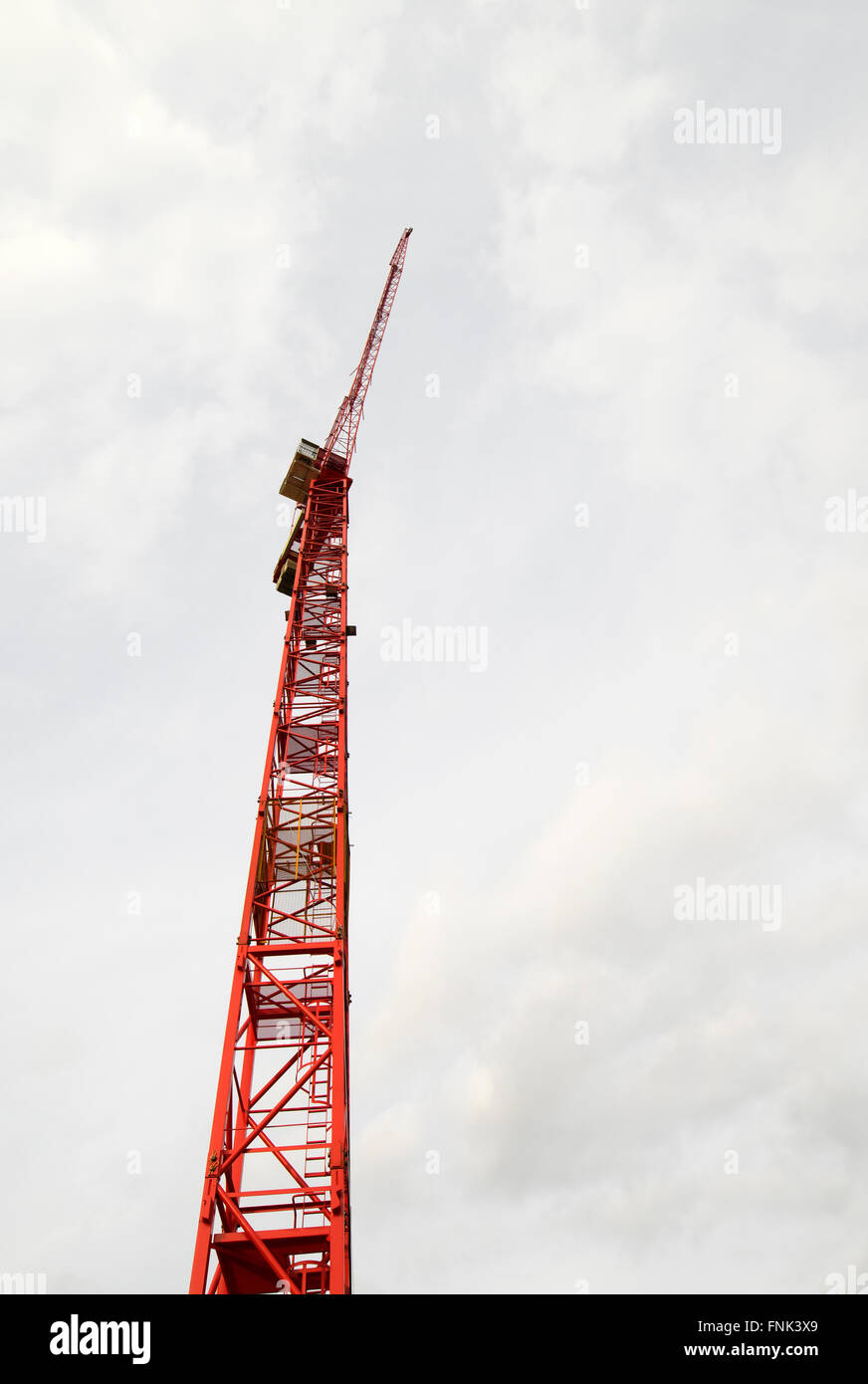 Looking up under a big red crane in Plymouth, Devon UK. Stock Photo