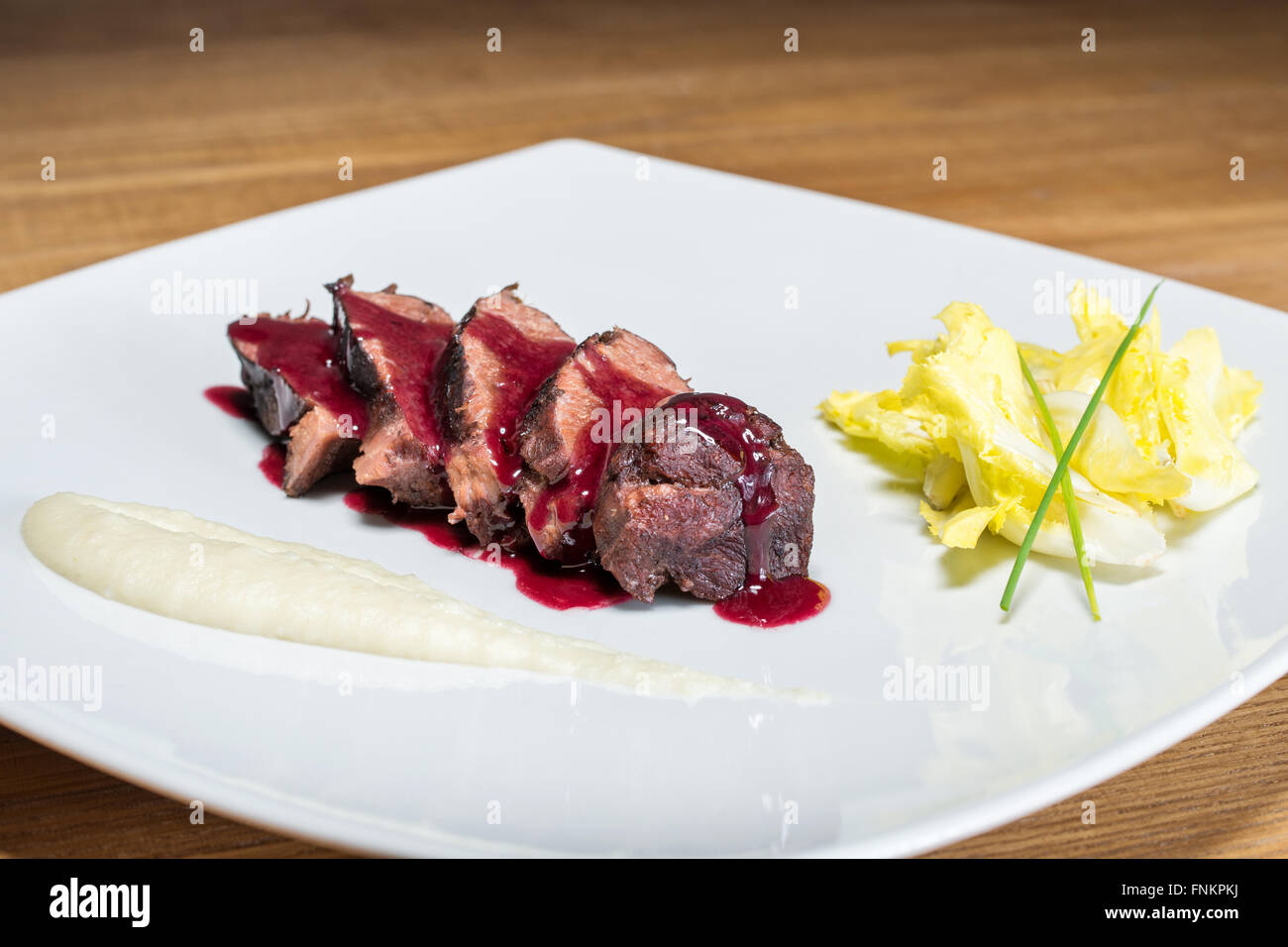 Veal cheek with balsamic reduction Stock Photo Alamy