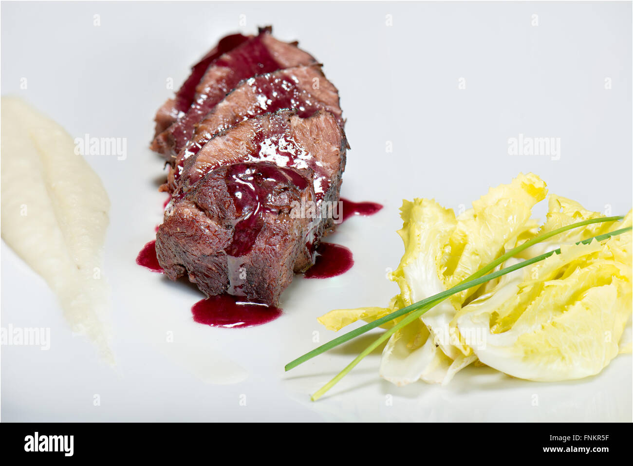 Veal cheek with balsamic reduction Stock Photo Alamy