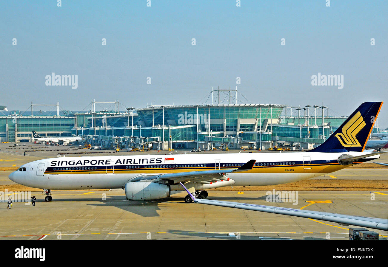 Airbus 330-300 of Singapore airlines landing in Incheon international airport South Korea Stock Photo