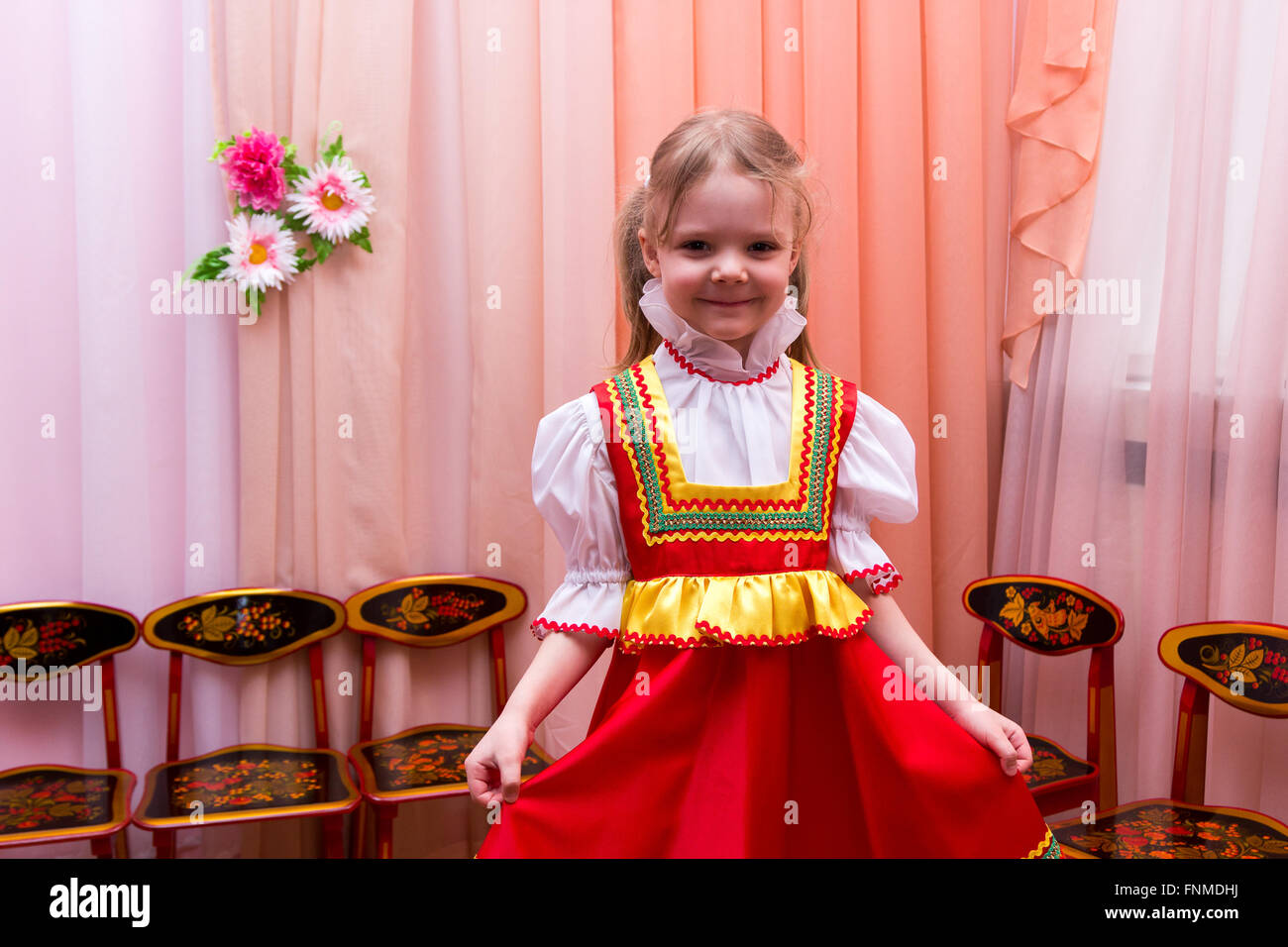 little girl in a red Russian national dress Stock Photo - Alamy