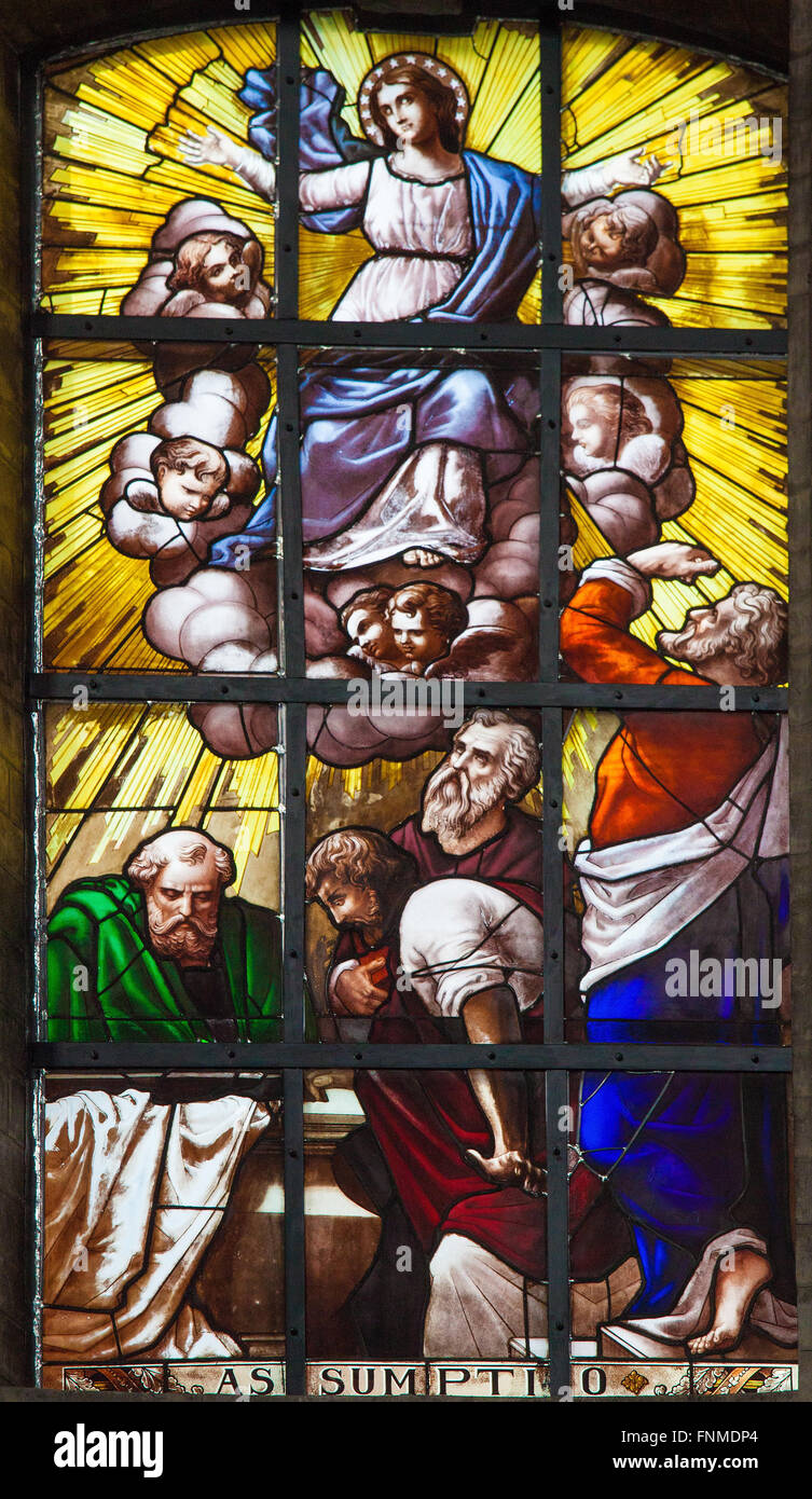 BRUSSELS, BELGIUM - JULY 26, 2012:  Stained glass window depicting the Assumption of Mother Mary in the cathedral of Brussels Stock Photo