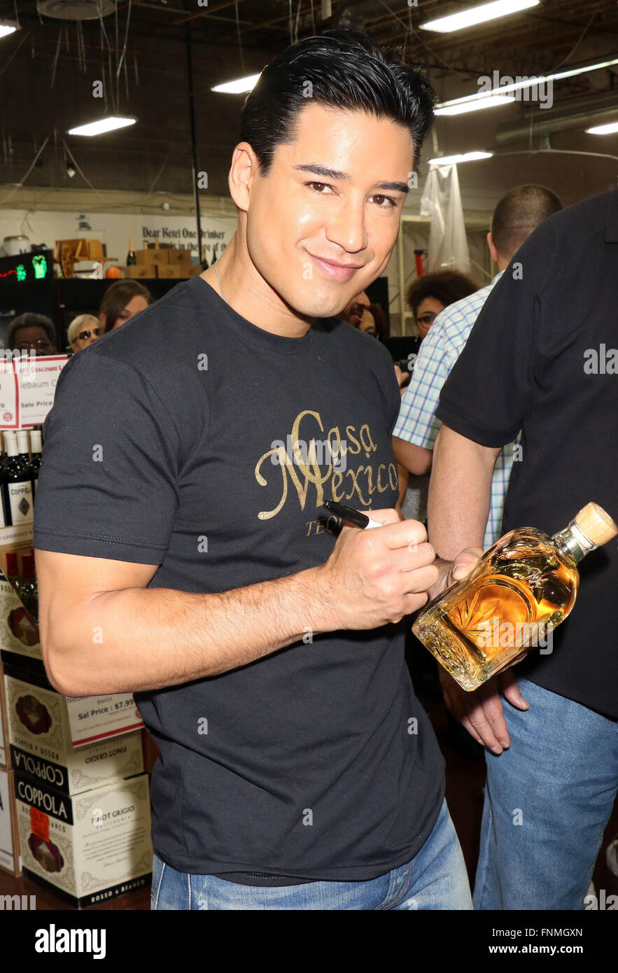 Mario Lopez signs bottles of Casa Mexico Tequila at Lee's Liquor