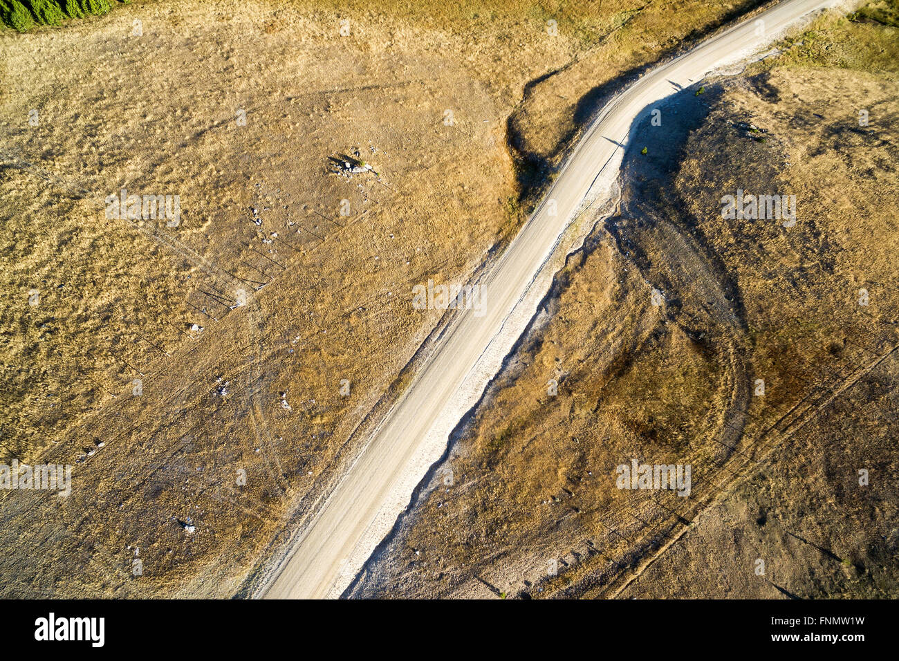 Aerial view of a dirt road in the Bighorn Mountains in Wyoming Stock Photo