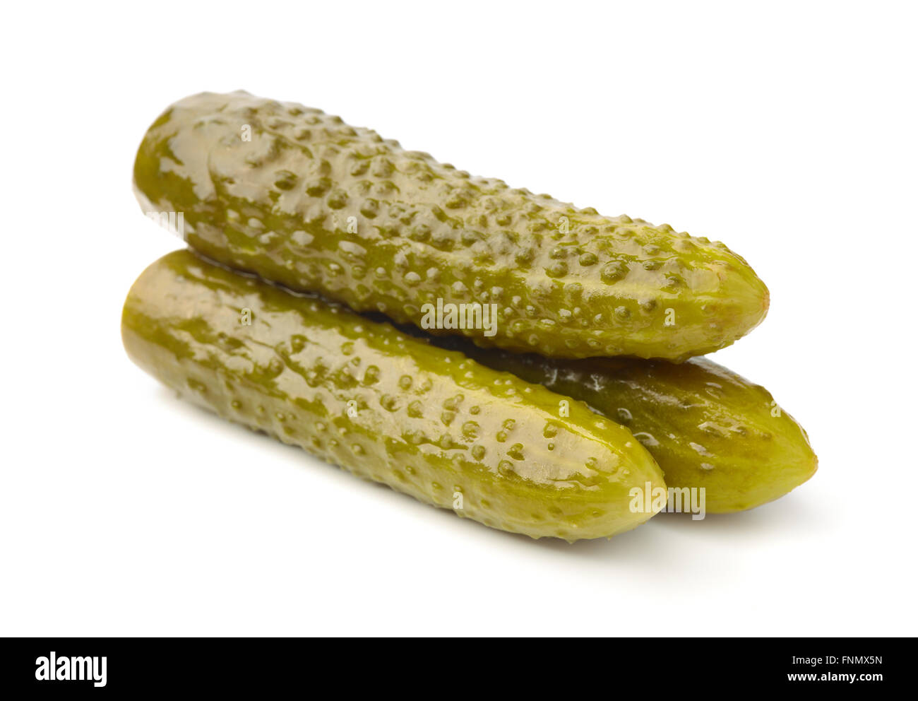 Three pickled cucumbers isolated on white Stock Photo