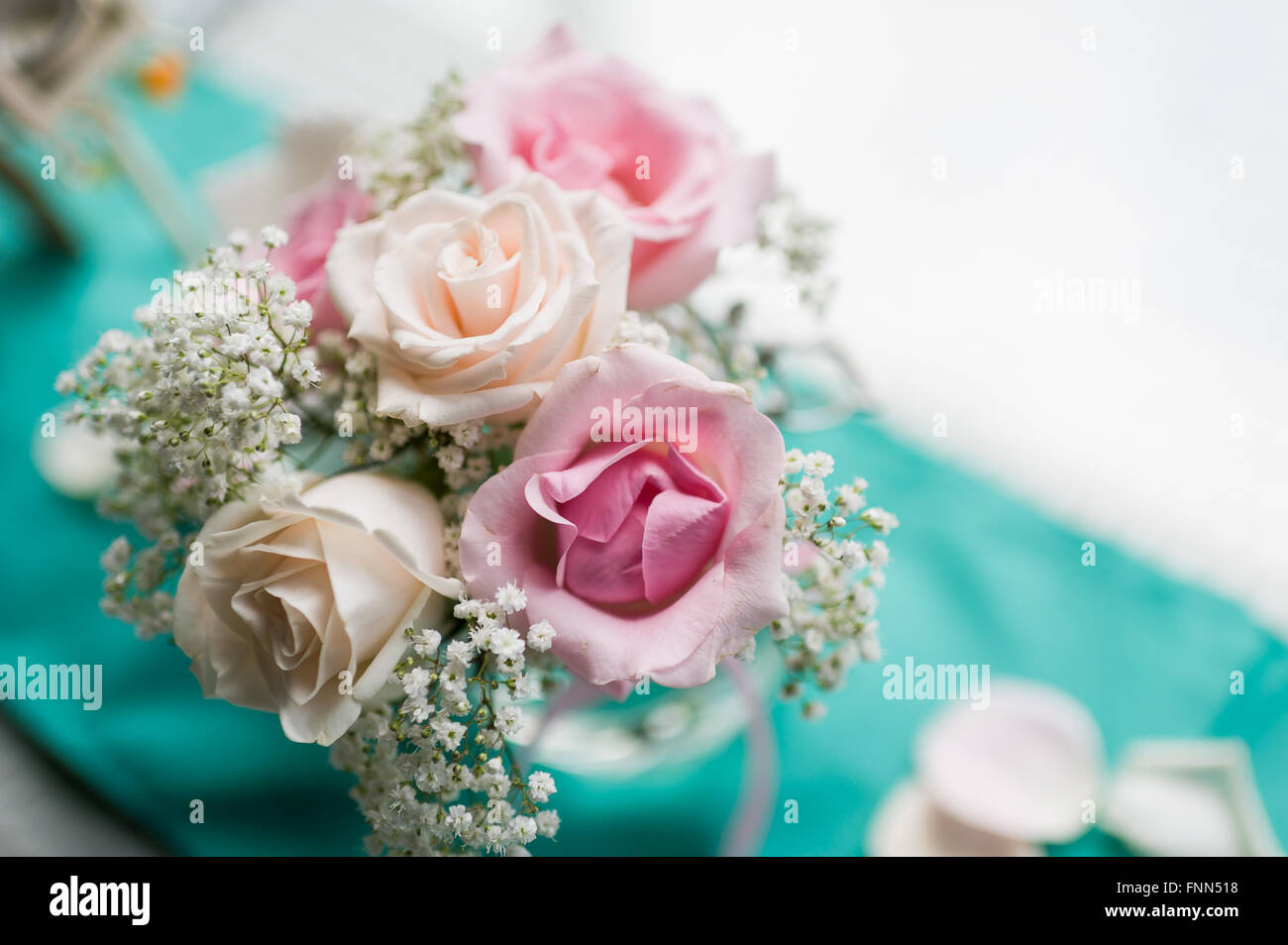 Pretty pastel colour flowers for table top decoration Stock Photo Alamy