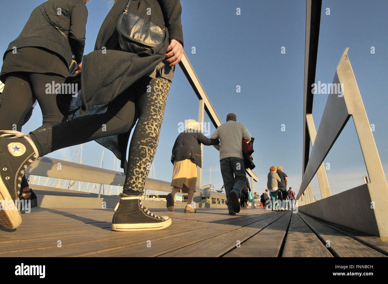 Rambla de Mar, pedestrian walkway, connects La Rambla to Port Vell, Barcelona, Catalonia, Spain. Stock Photo