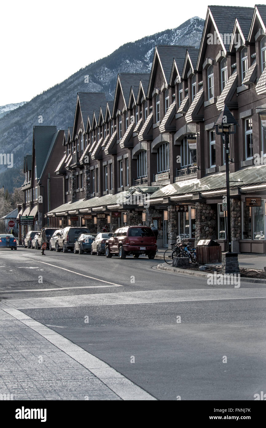 A scenic view of row houses on a commercial street in the town of Banff Alberta Stock Photo