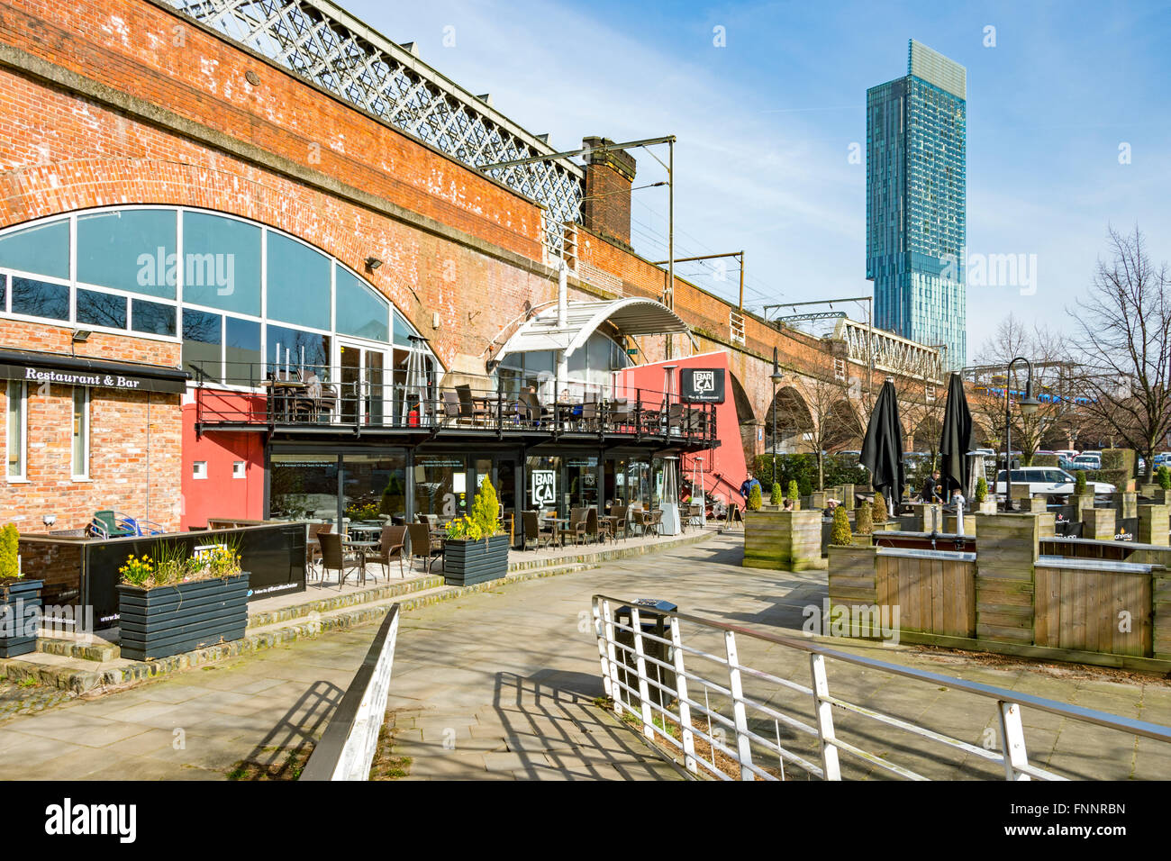Railway viaduct and bar at Catalan Square, Castlefield, Manchester