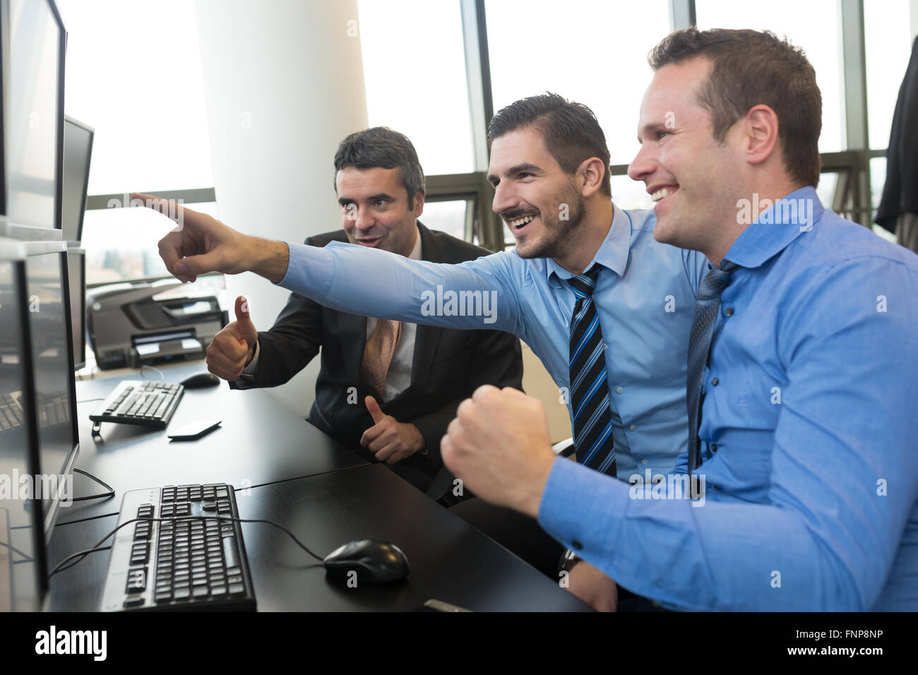 Successful business team in office Stock Photo - Alamy