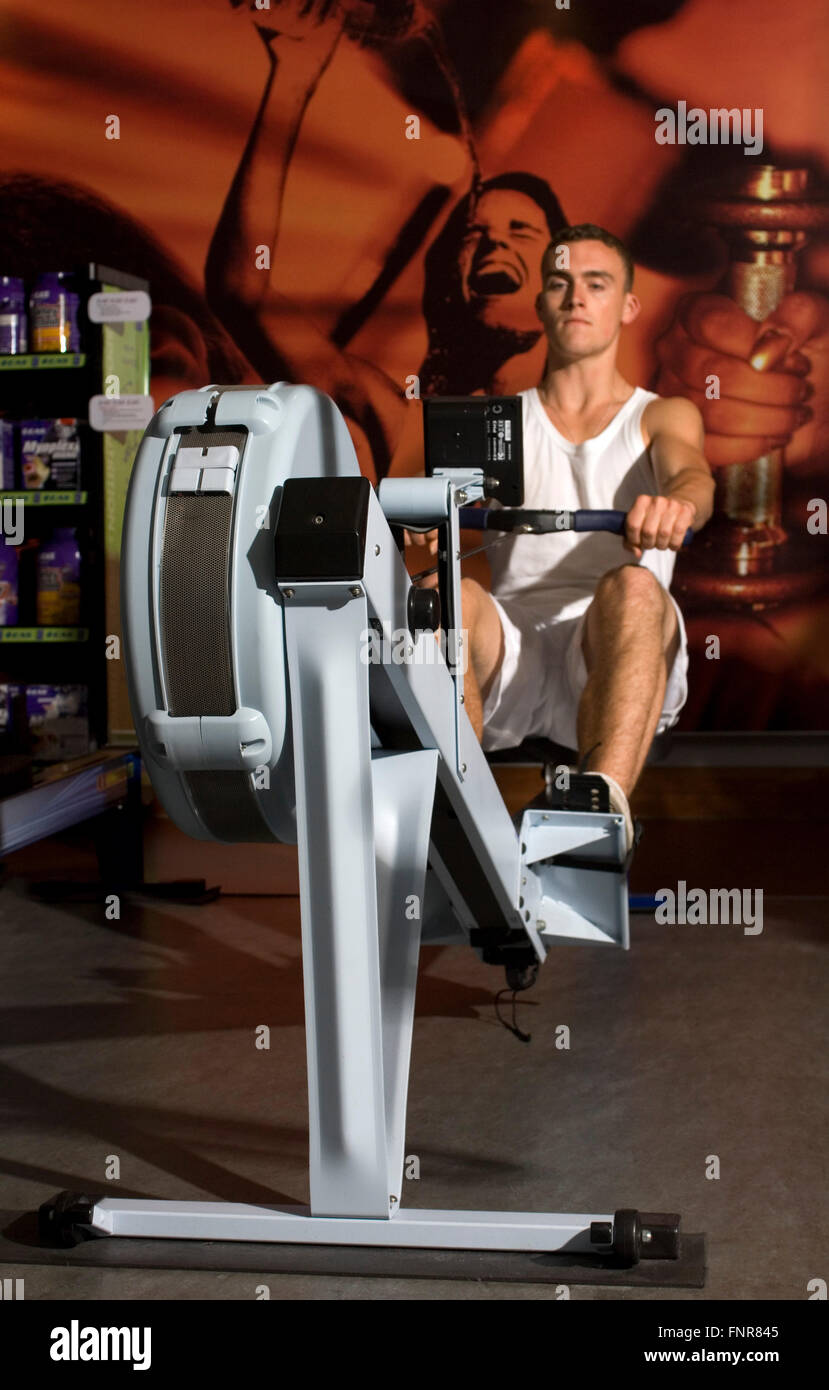 Fla. Man Rowing Machine man exercising on a rowing machine Stock Photo - Alamy