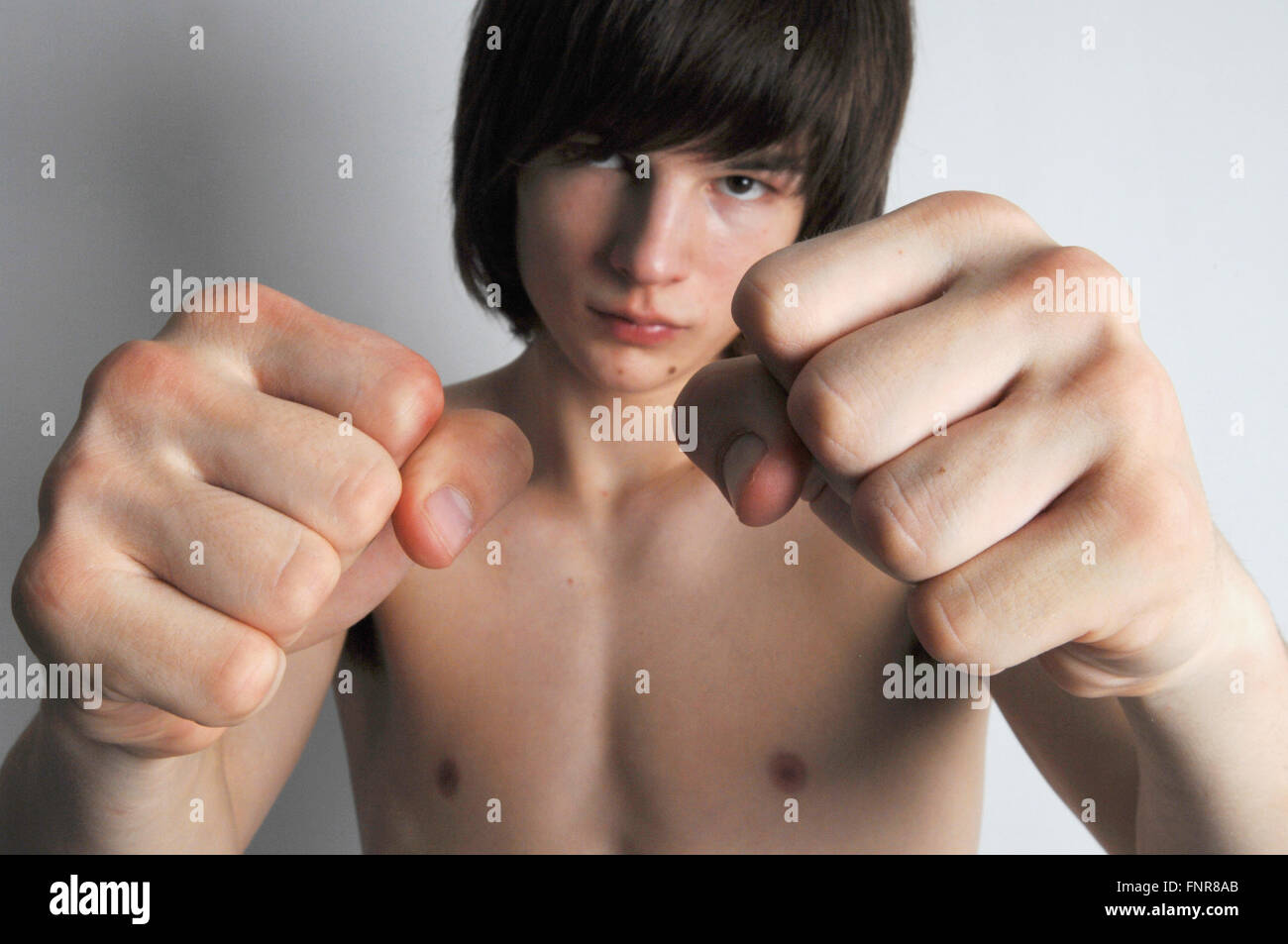 A teenage kick boxer keeping fit. Stock Photo